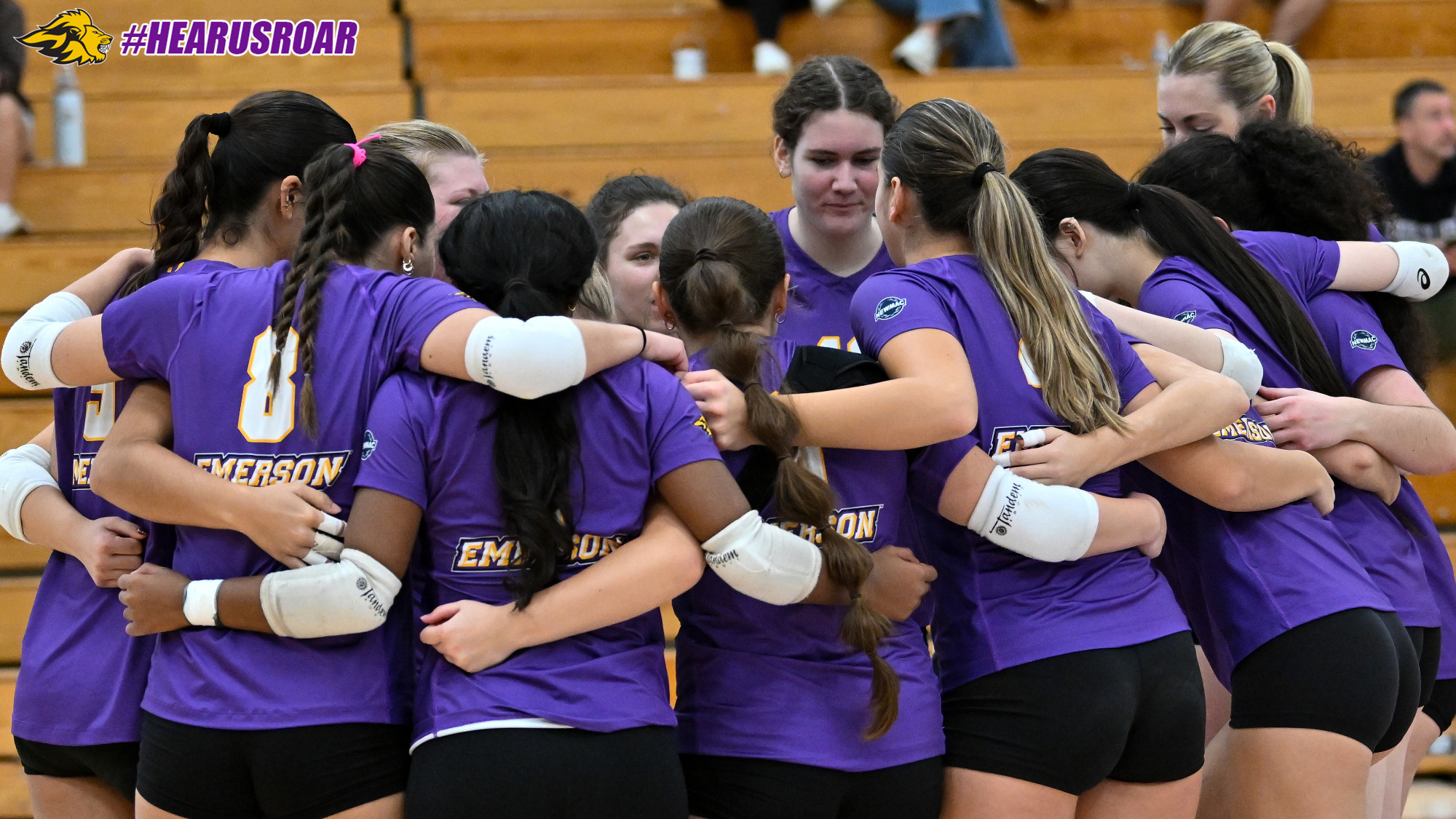 Women's Volleyball huddles before its match at Springfield