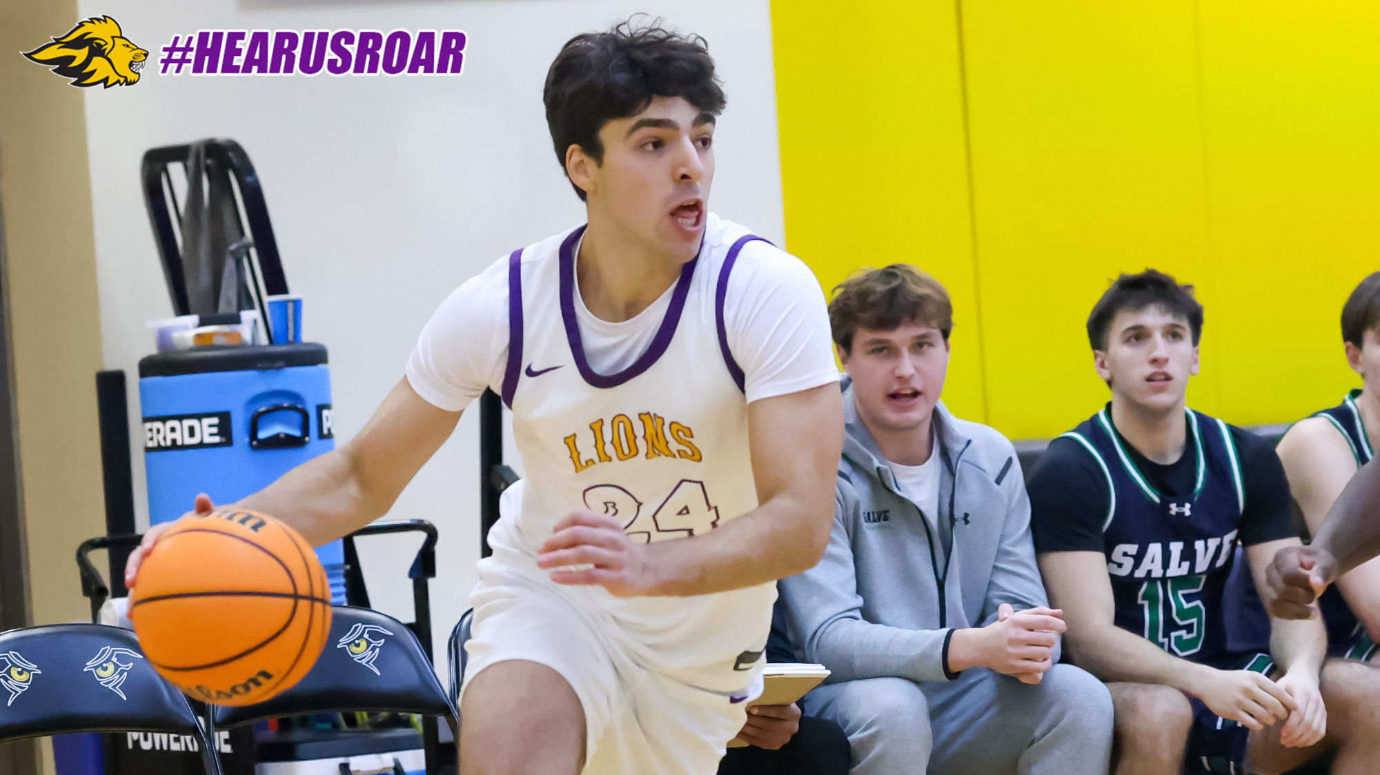 Shay Roban drives into the lane against Salve Regina