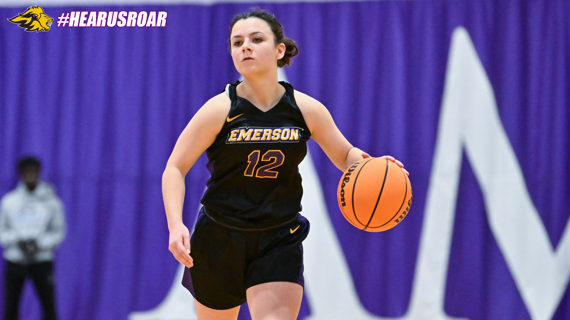 Bri Frongillo surveys the court at Amherst