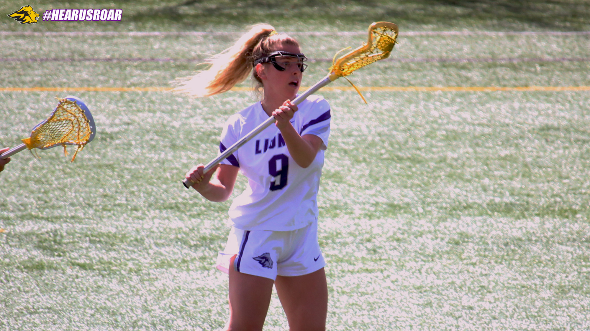 Ava DelliCompagni collects the ball against Mount Holyoke