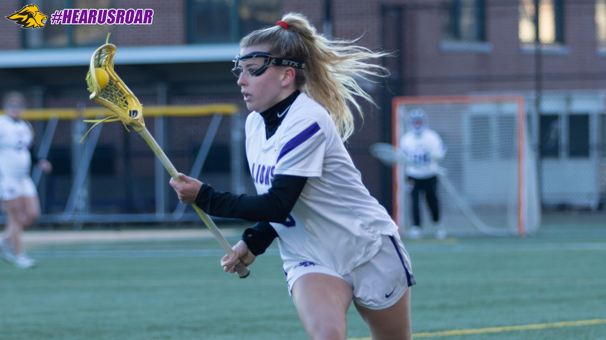 Ava DelliCompagni moves up field against Oneonta
