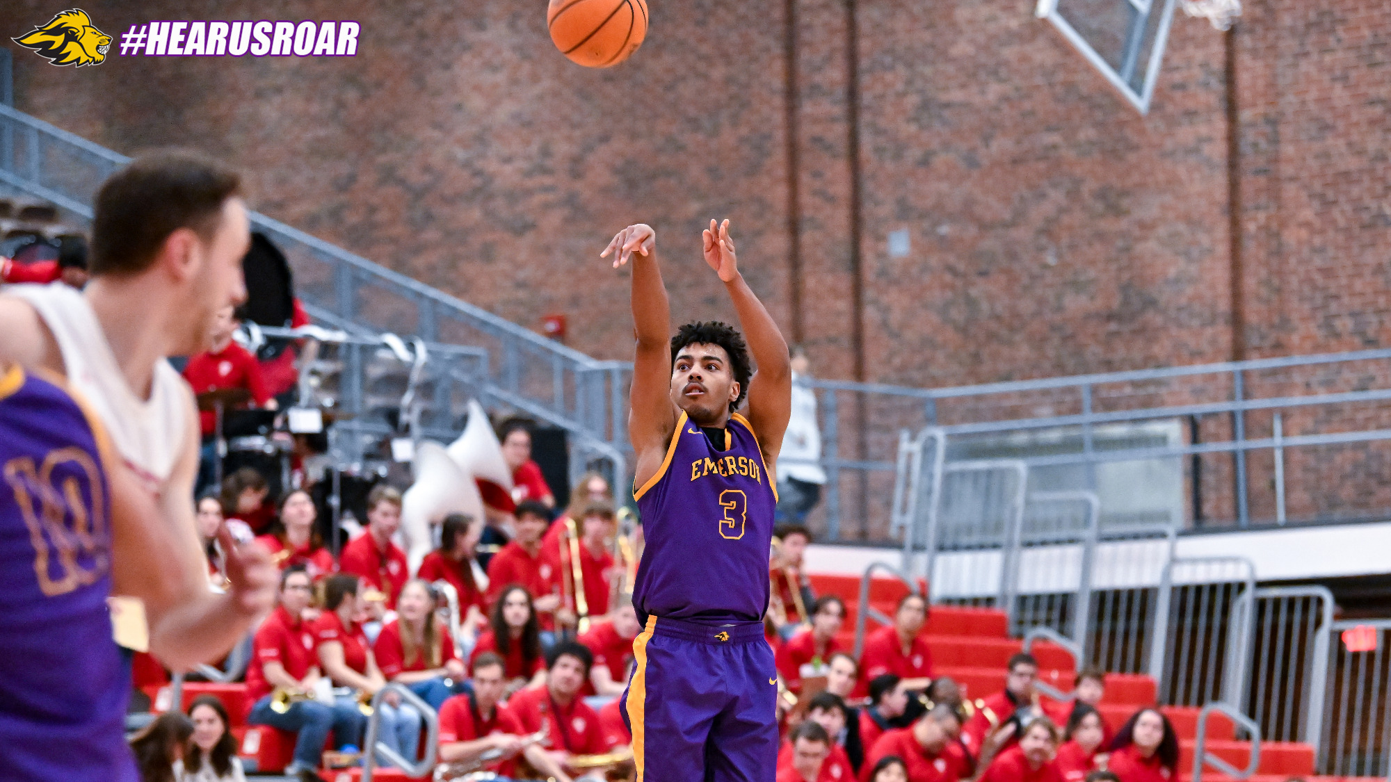 Jacob Armant shoots a three-pointer at WPI