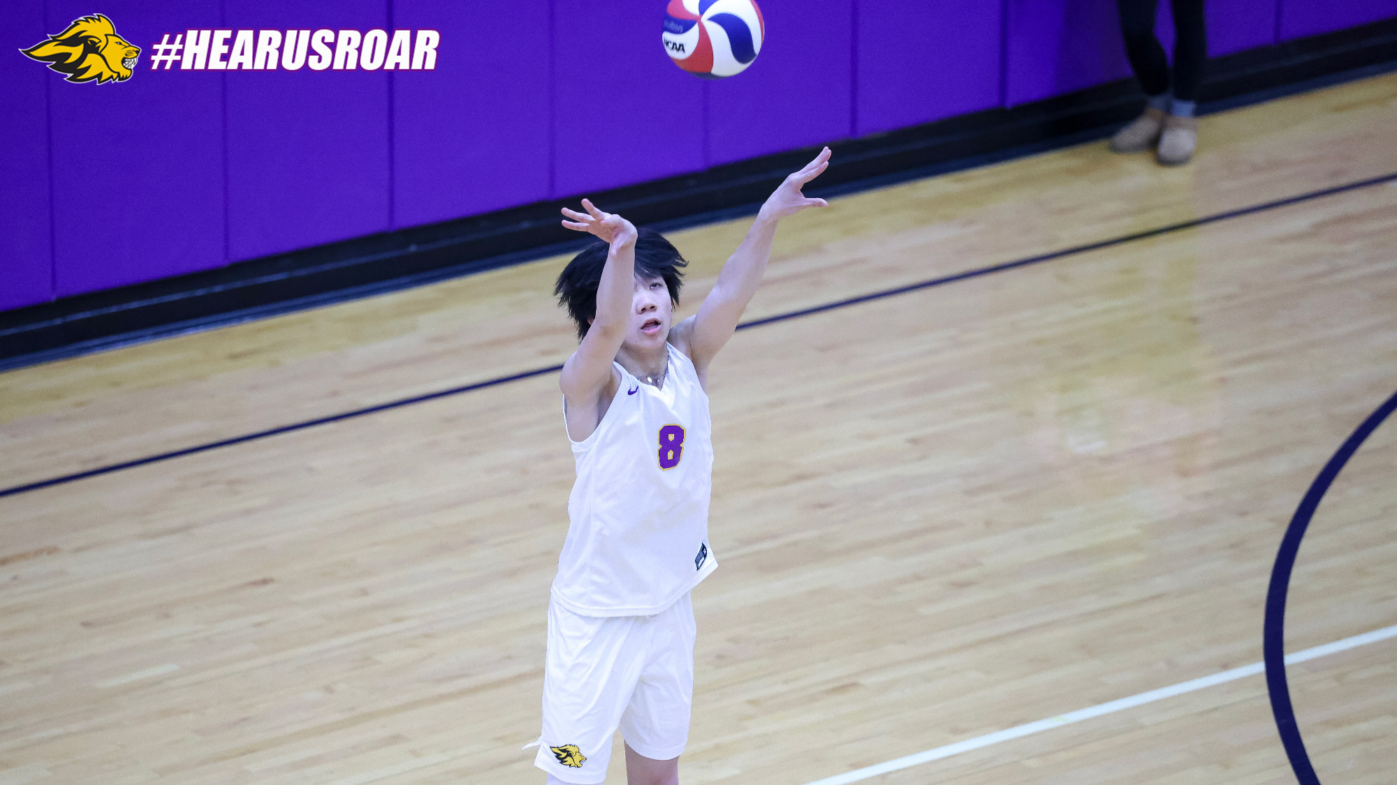 Ryan Chen sets against VTSU Johnson