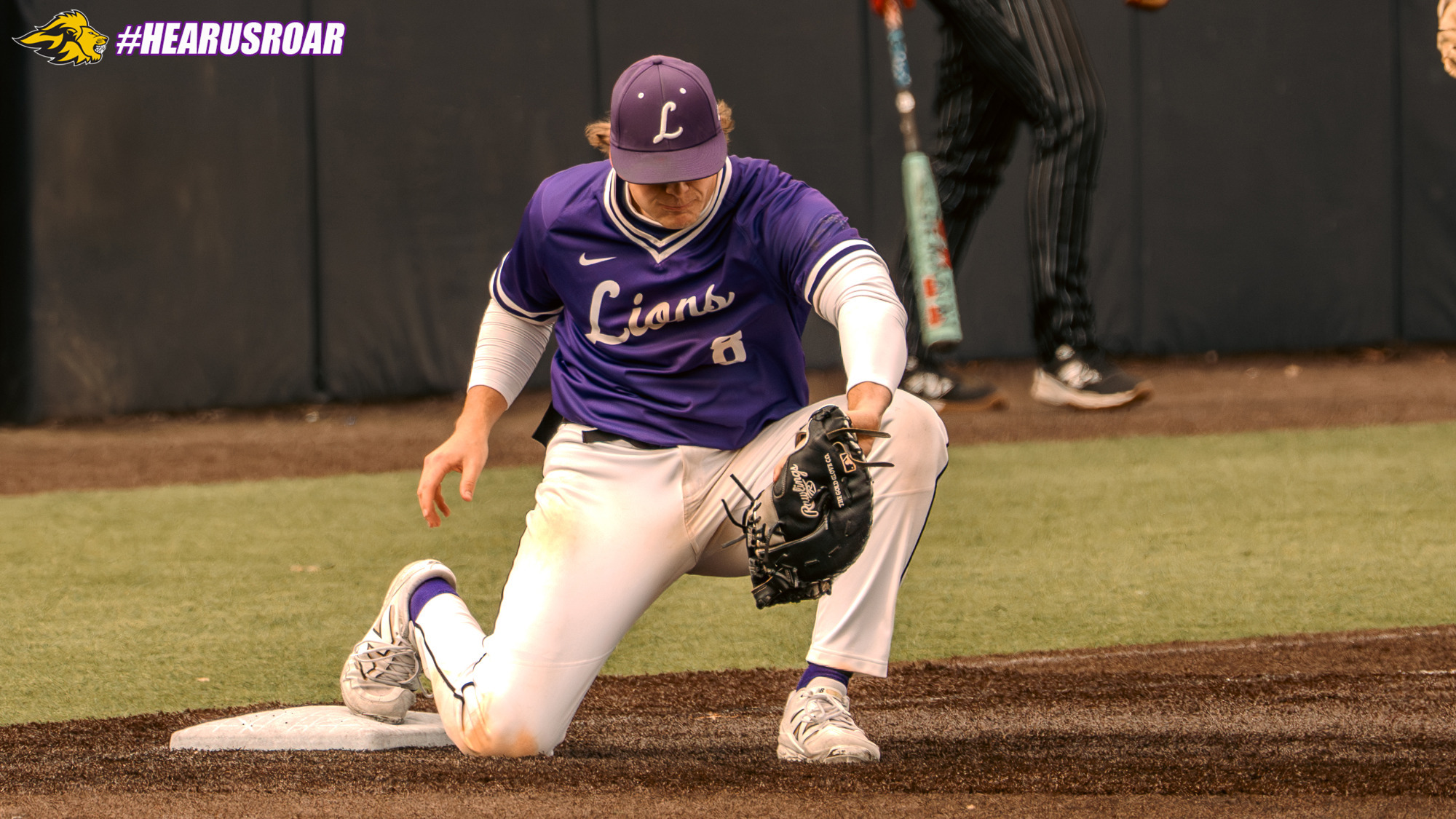 Braeden O'Connell scoops a throw against Thomas College
