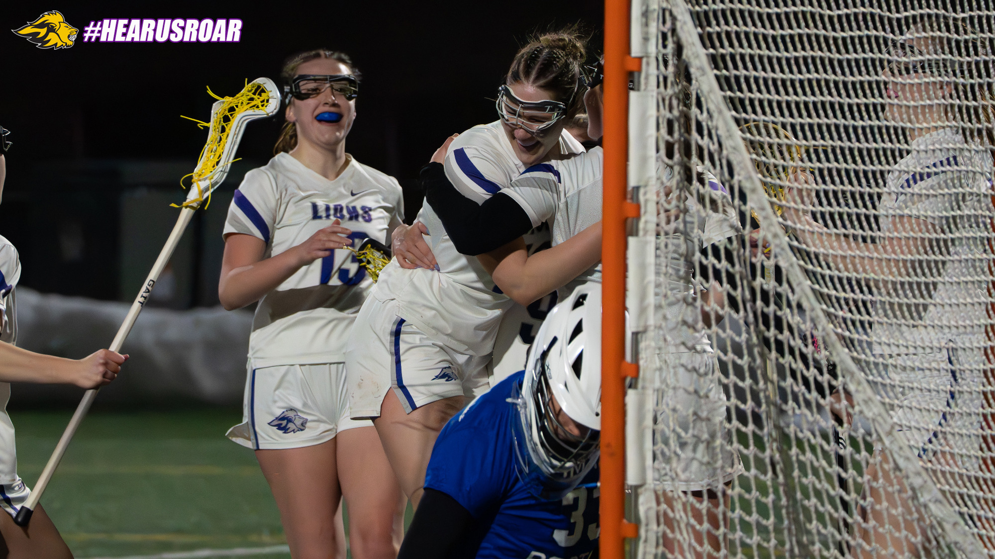 Laina Gustafson celebrates the winning goal against UMass Boston