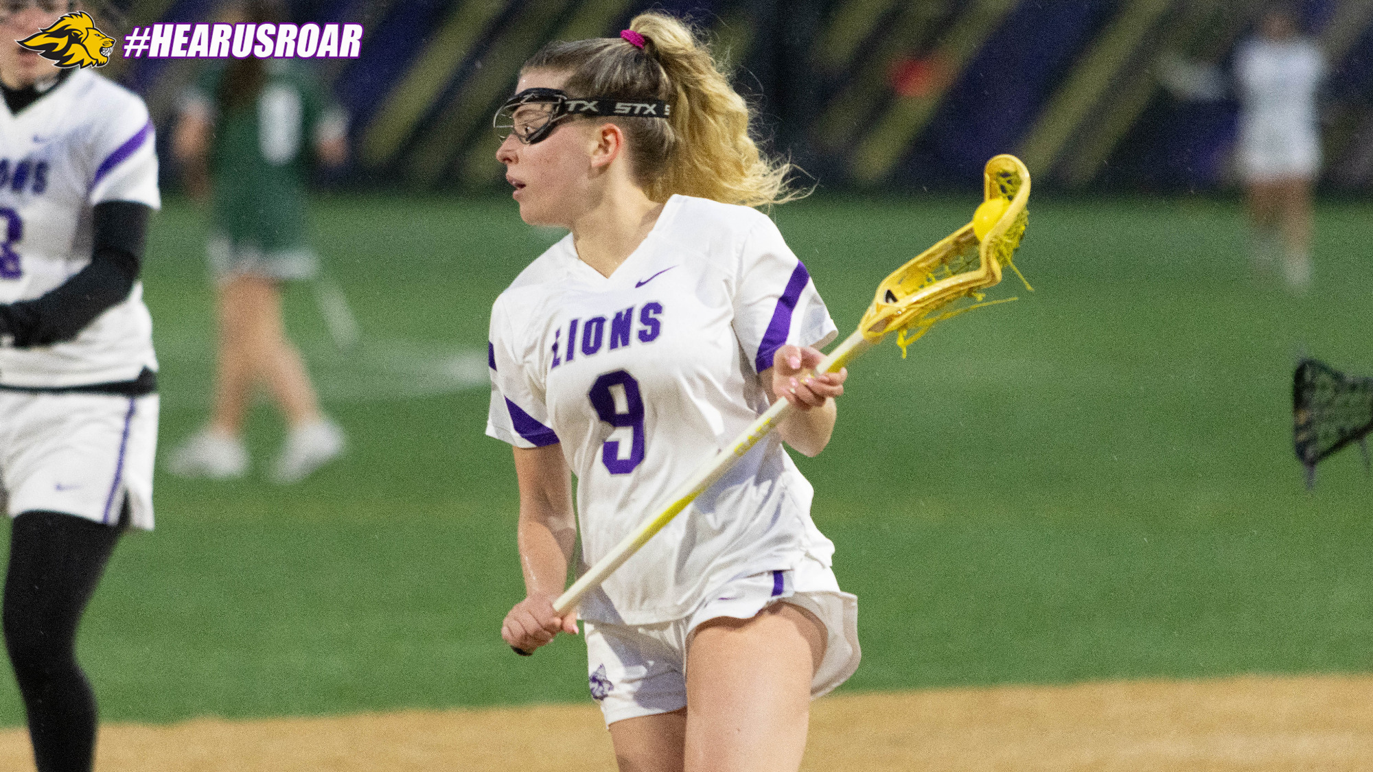 Ava DelliCompagni surveys the field against Babson