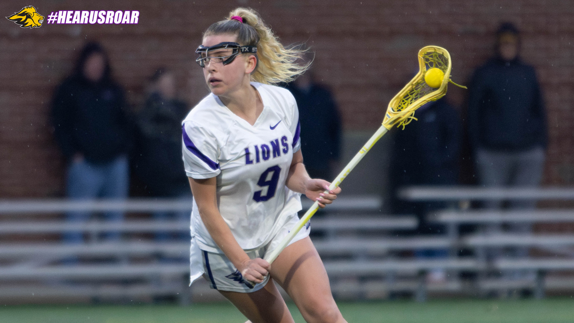 Ava DelliCompagni looks to pass against Babson