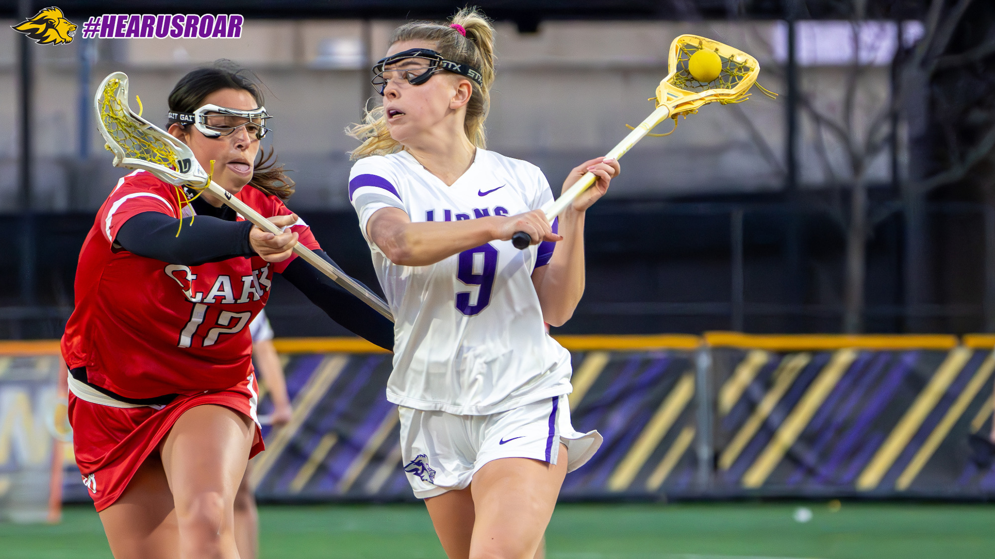 Ava DelliCompagni looks to shoot against Clark