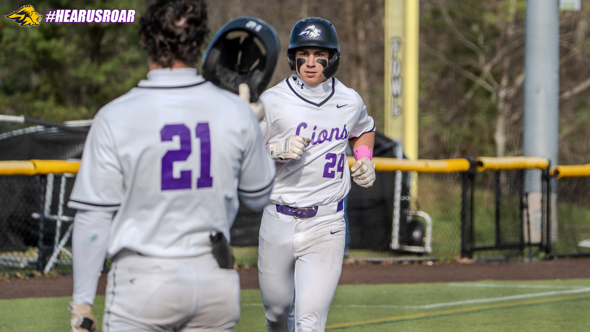 Vincent Fuller heads home after hitting a solo home run against Clark