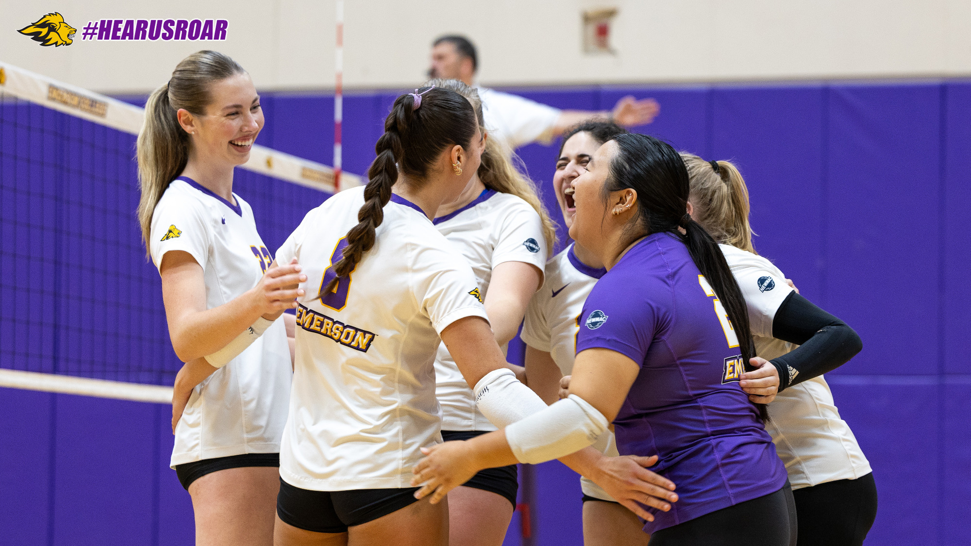 Women's Volleyball celebrates a point against Mount Holoke