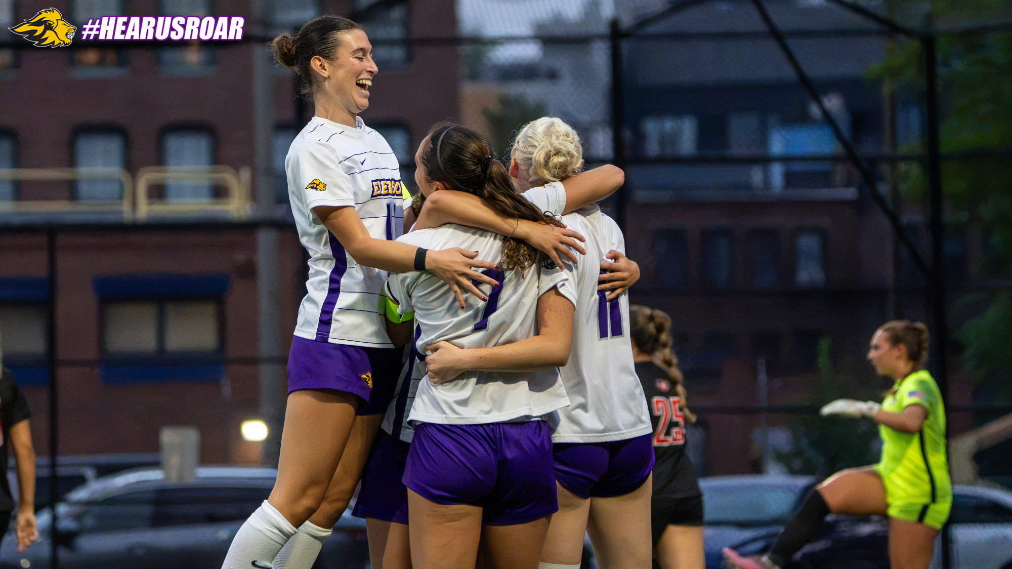 Emerson Women's Soccer celebrates a goal against Keene State