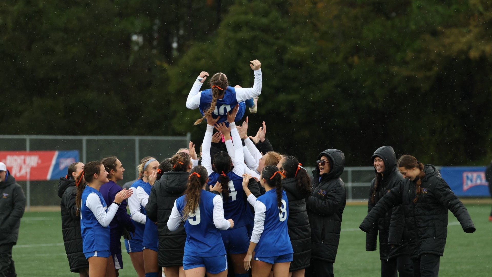 Tessa Updegraff lifted in air