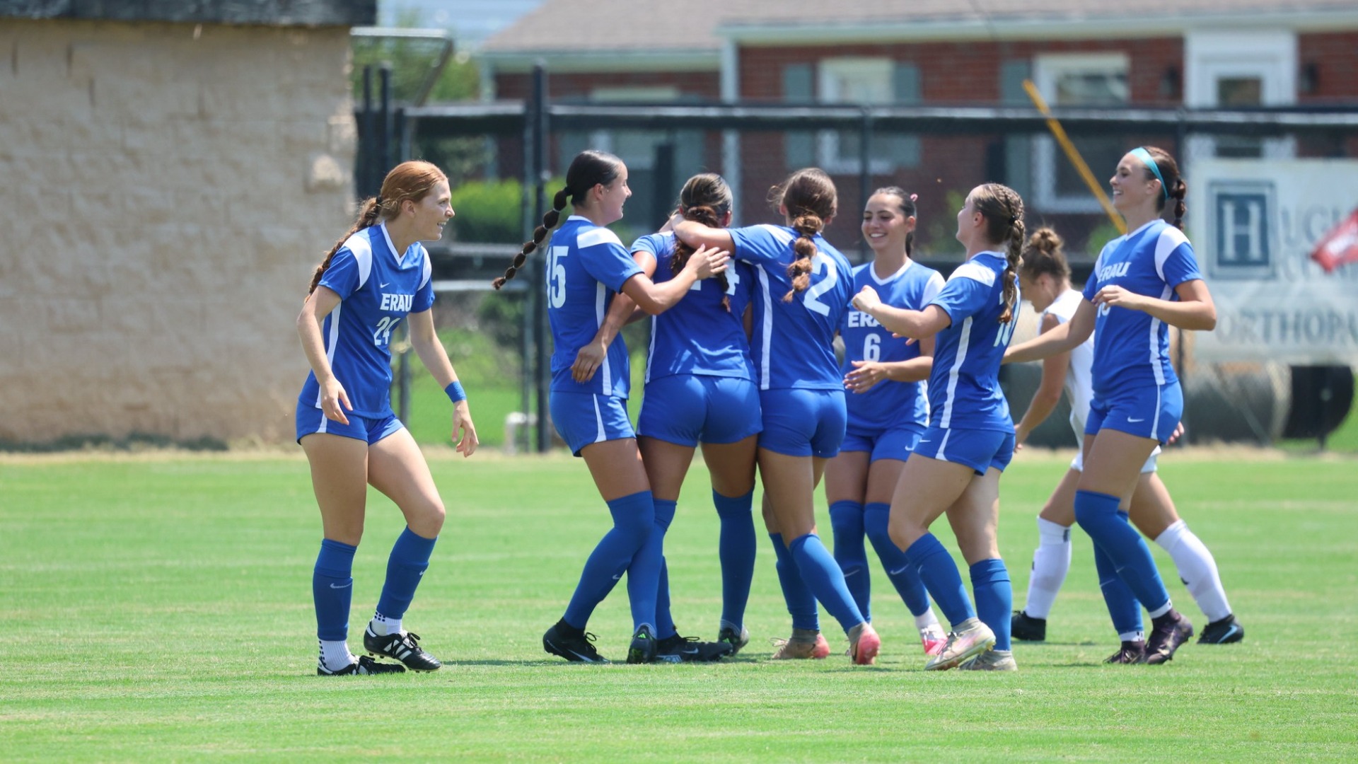 W Soc Celebrating Goal