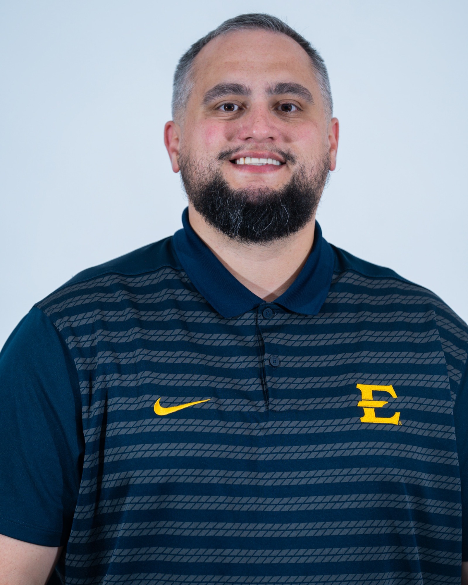 Gracia_Eric_2526WBB_Headshot_CD_DL_001