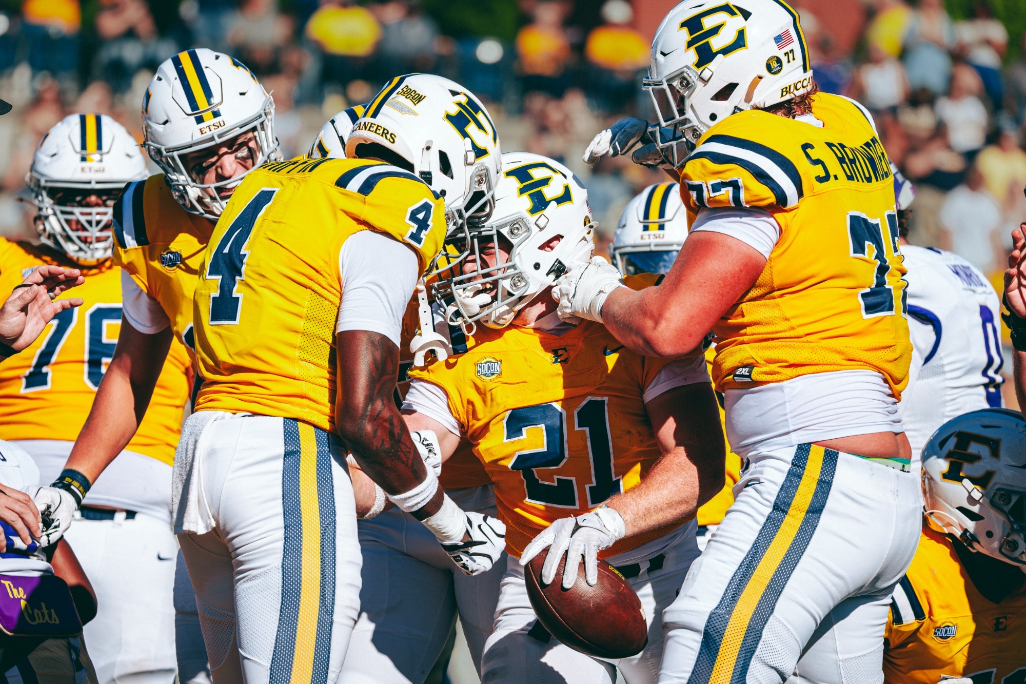 Group of ETSU football players celebrate a touchdown in a win over Western Carolina