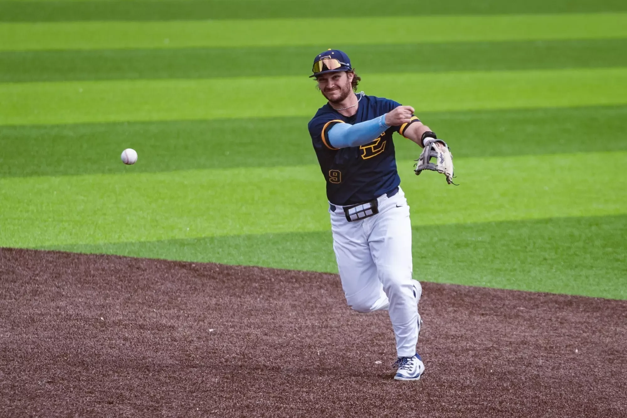 Luke Matlock throws the ball to first base in a win over Bradley