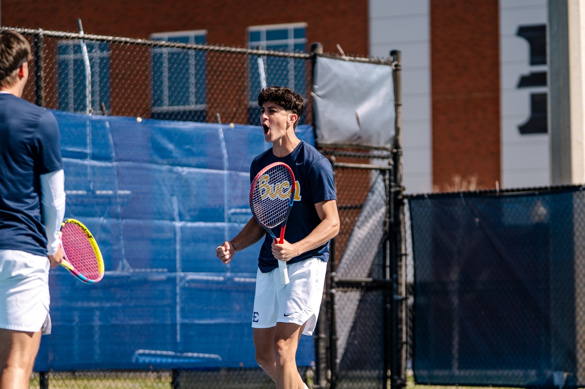 Oscar Martinez celebrates winning a point against Mercer