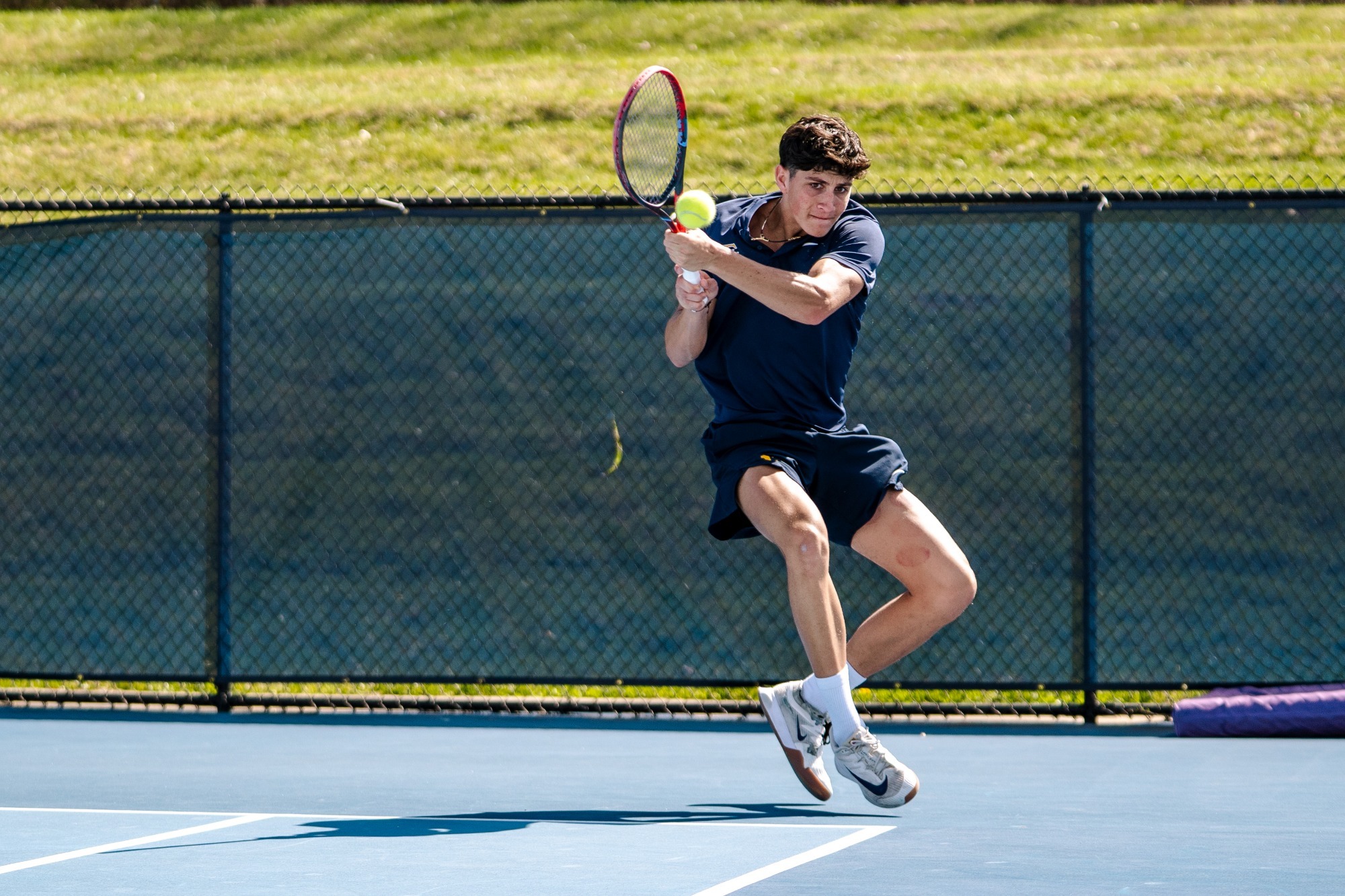 Oscar Martinez plays a ball in a match against UNC Greensboro