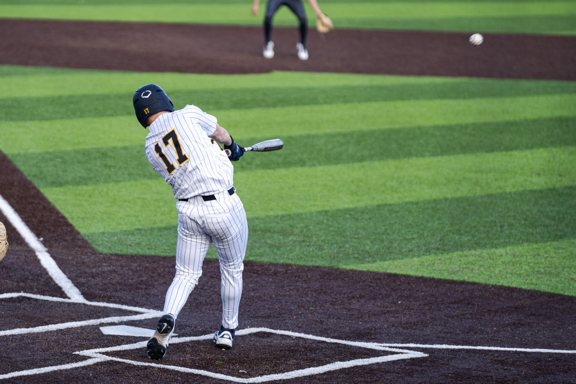 Nate Conner makes contact with a pitch against Quinnipiac