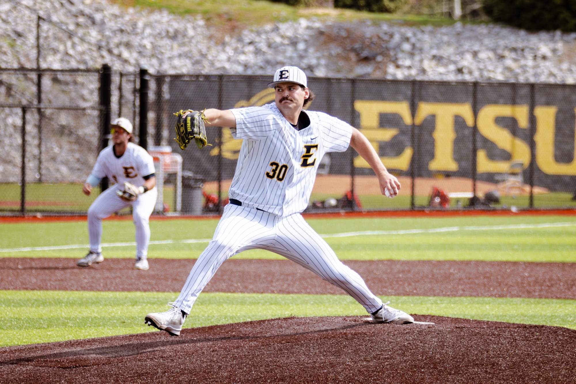 Tadan Bell throws a pitch in a game against VMI
