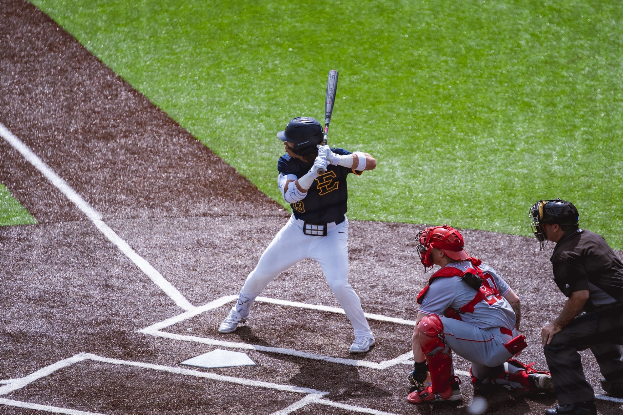 Axel Melendez readies to a hit a pitch in a game against Bradley