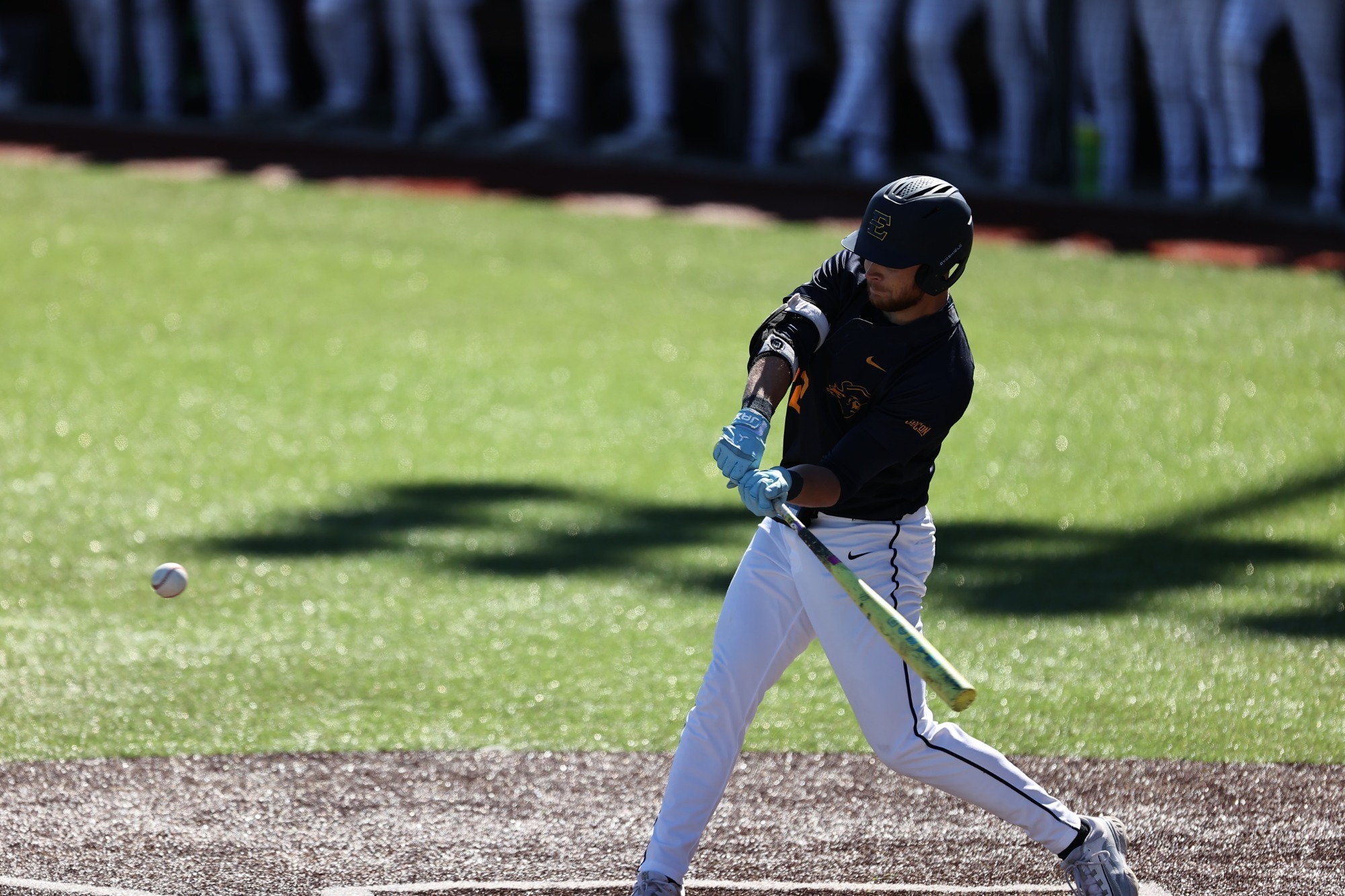 Tristan Curless takes a swing in a game against VMI