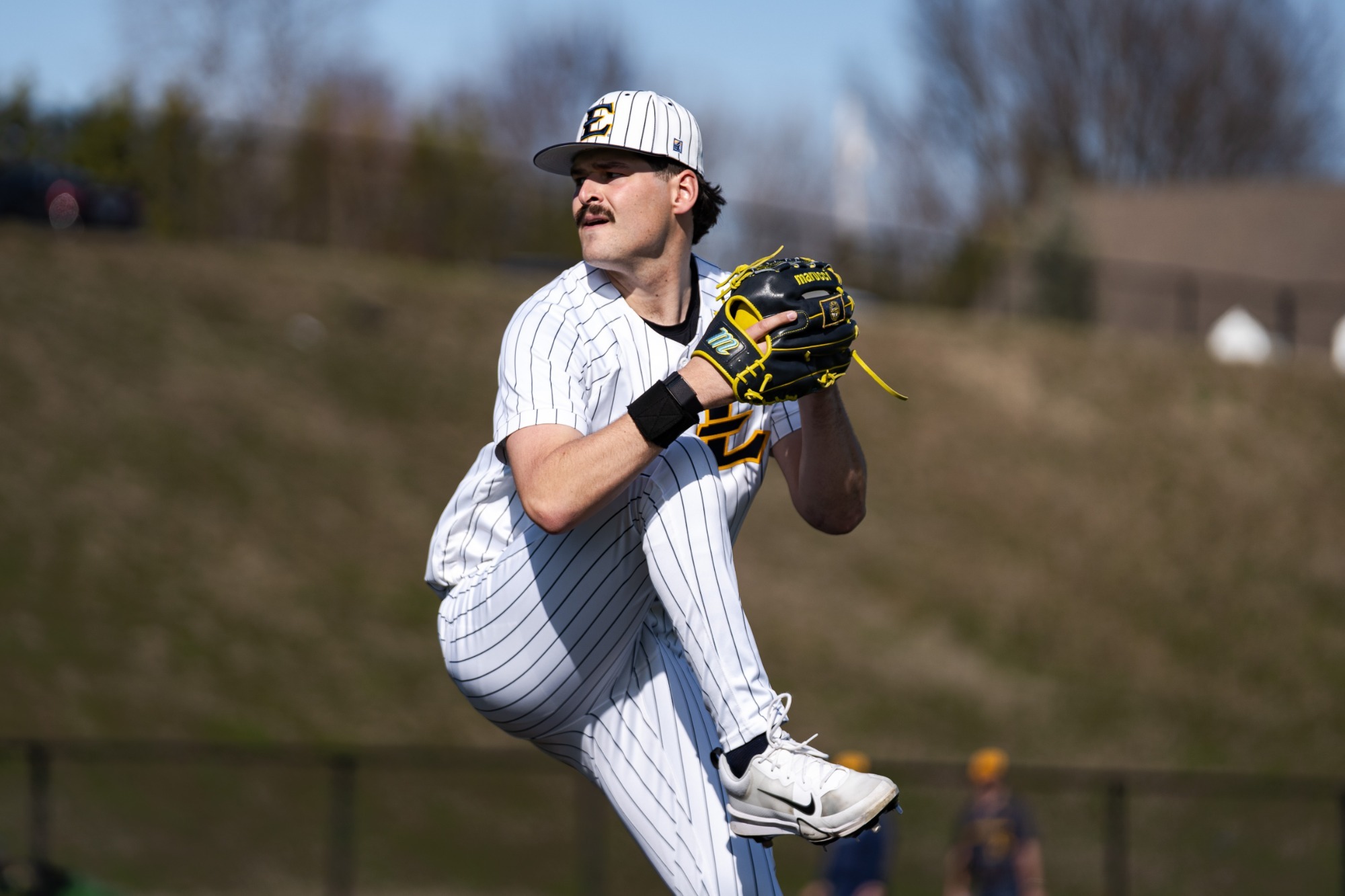 Tadan Bell throws a pitch against Quinnipiac