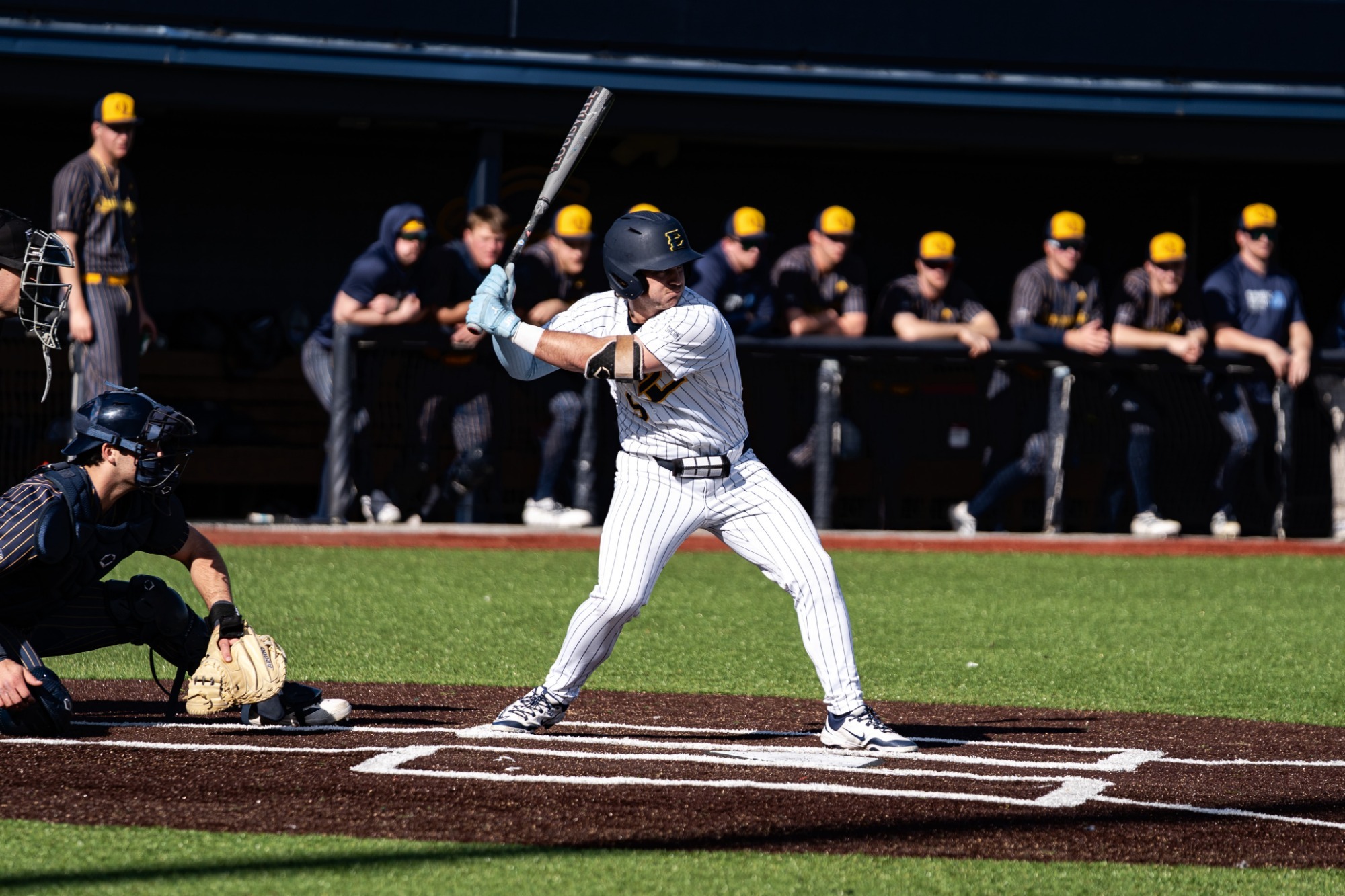 Luke Matlock readies to take a swing against Quinnipiac