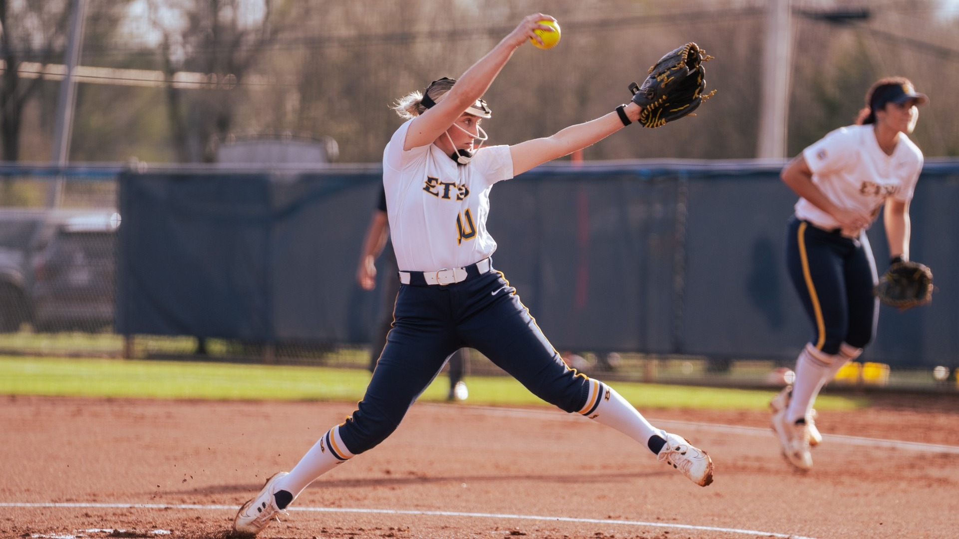 Softball's Eden Muncy mid-pitch 