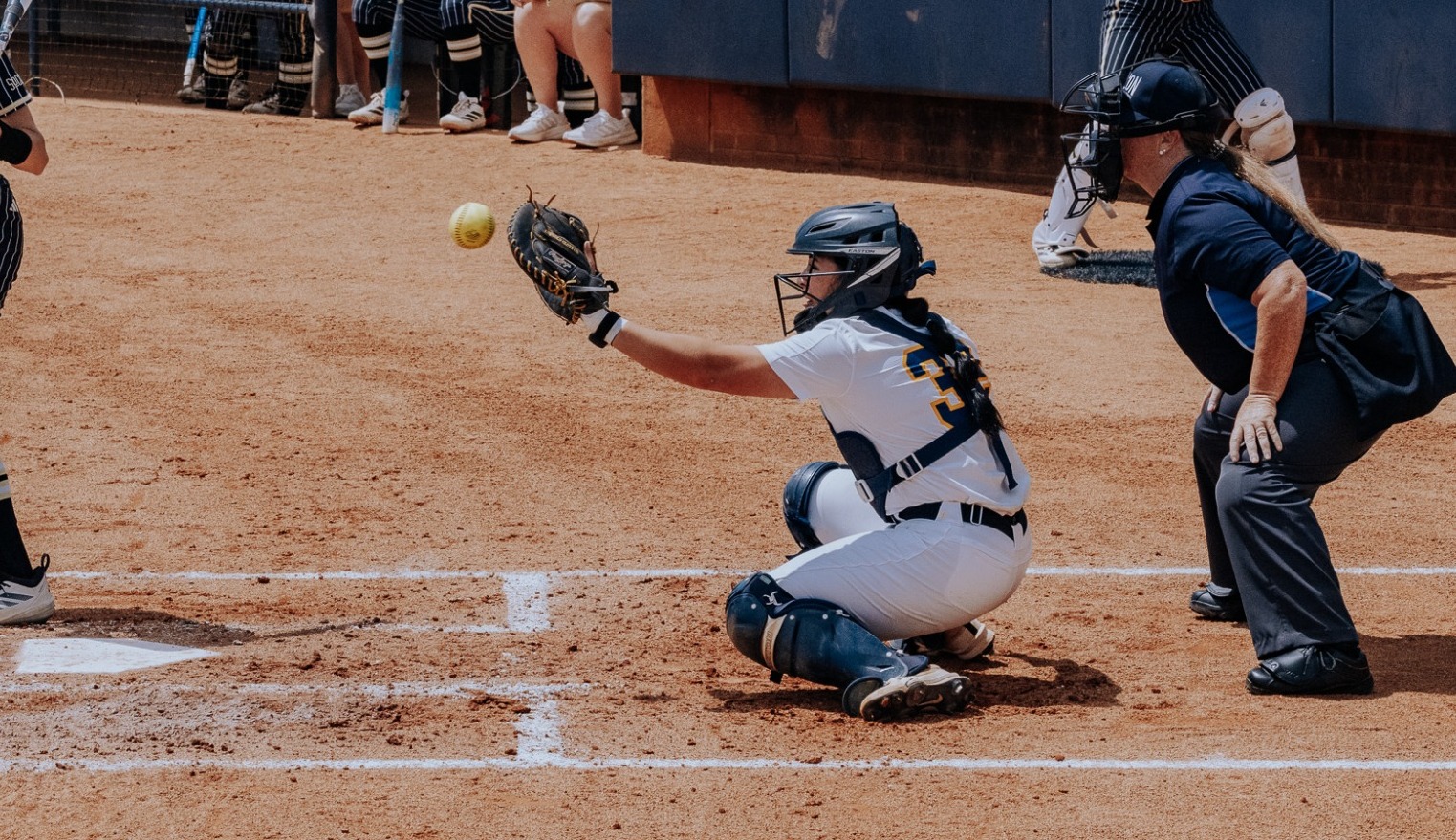 Softball's catcher, Leinani Lutu, catching a pitch in the first game of the doubleheader versus Wofford on April 18, 2026.