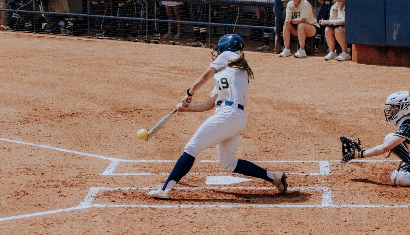 Softball's Whitney Boone in the batter's box making contact with a ball in game two of the Wofford series on April 18, 2026.