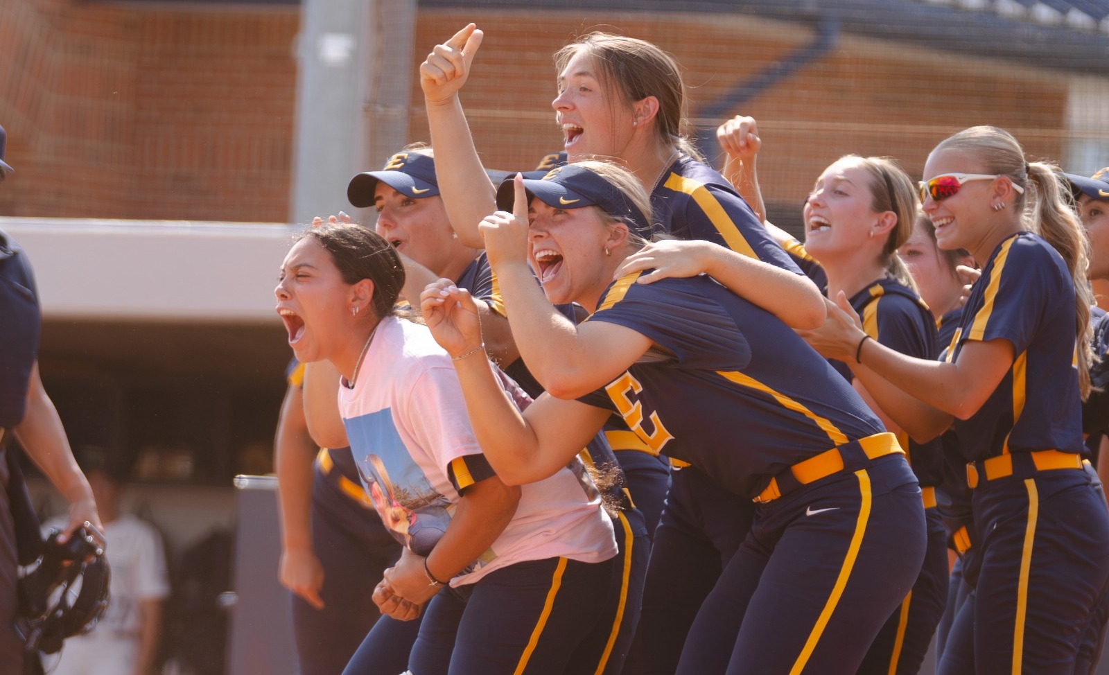 Softball's bench celebrating at the plate after Payton Moore hit a three-run home run to help the Bucs defeat Samford 7-0 in the final game of the series on April 24, 2026.
