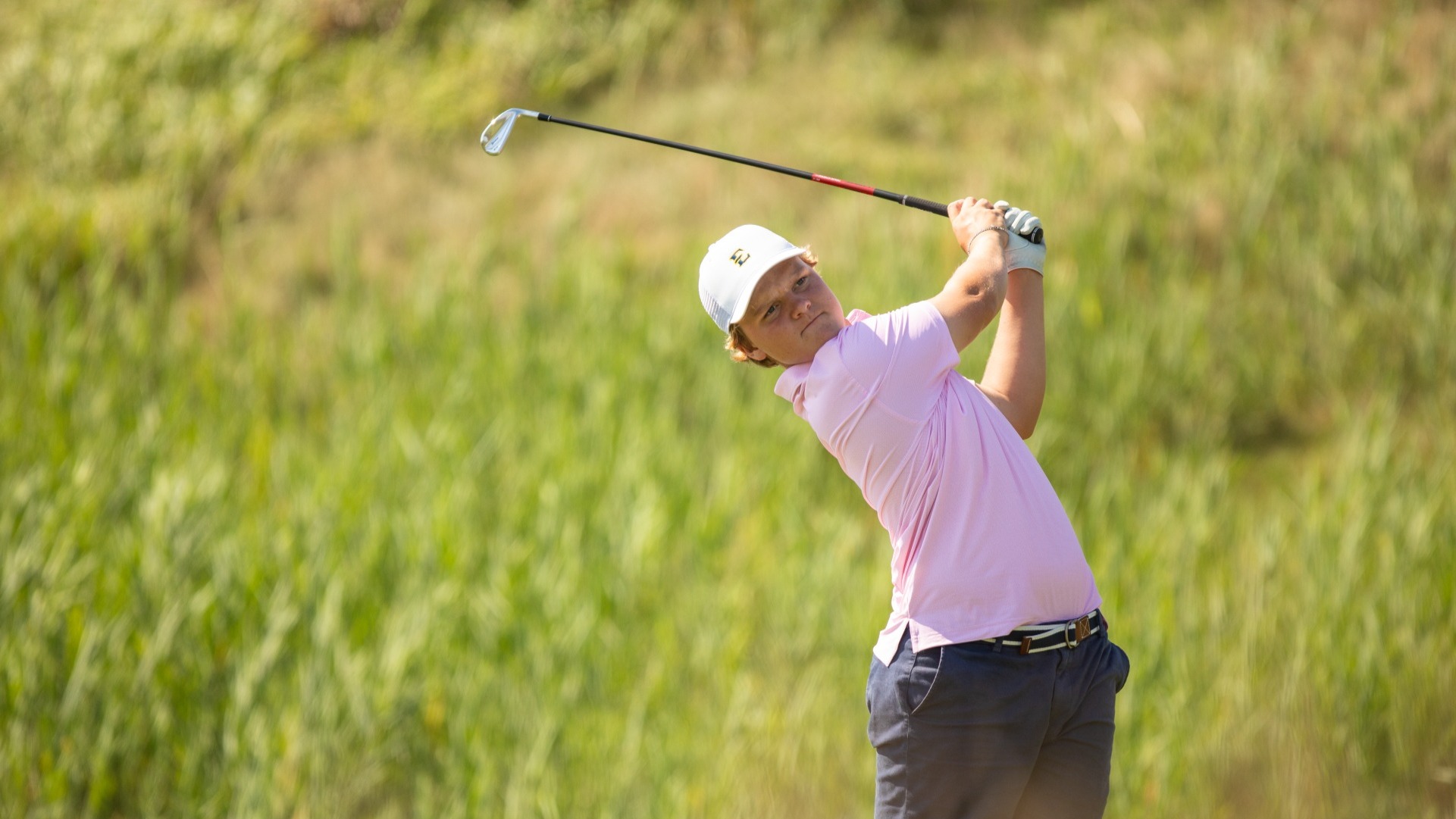 Veigar Heidarsson swinging an iron at the Highlands Invitational in Chicago.