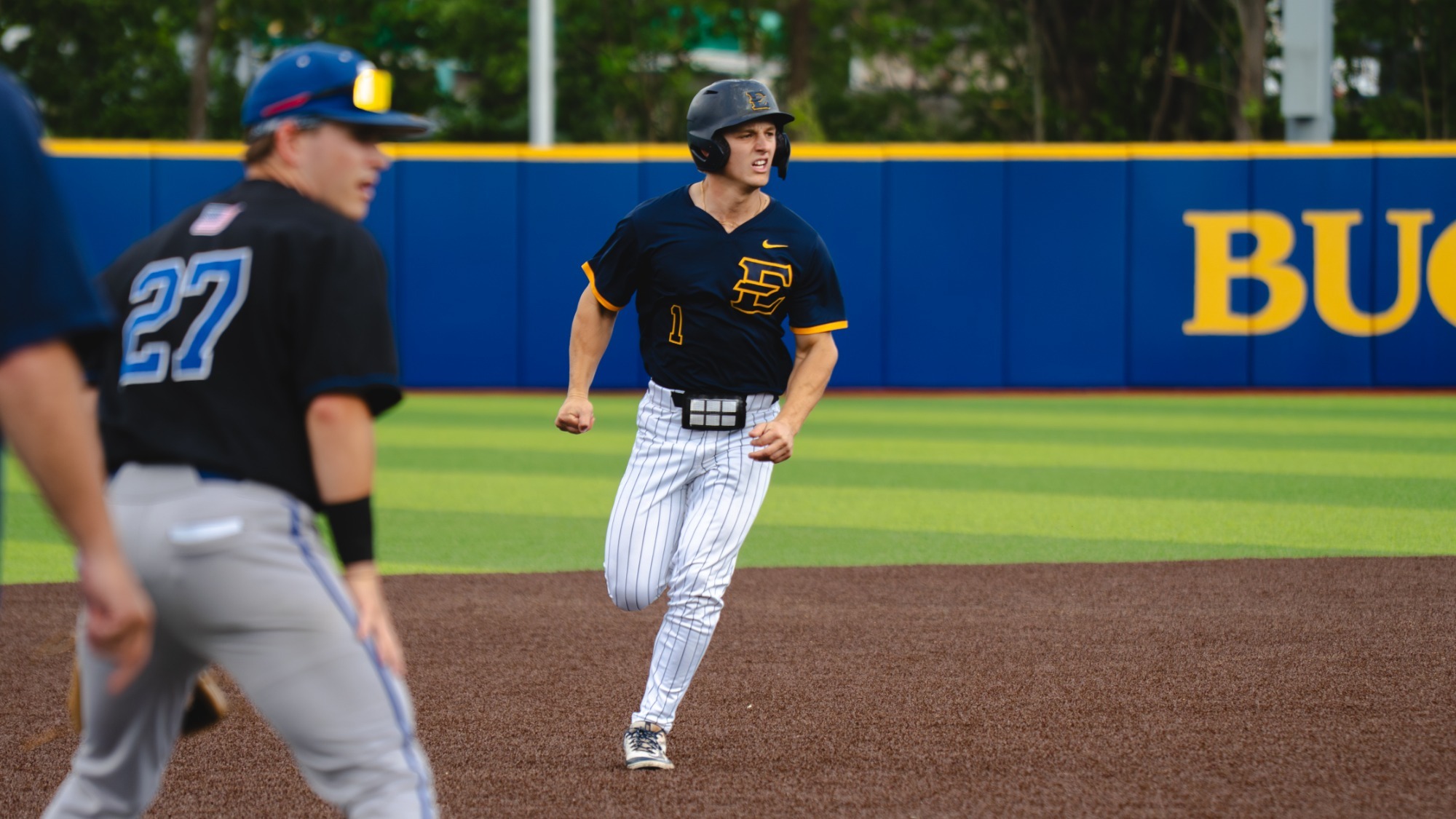 Jamie Palmese comes into third base in a game against UNC Asheville