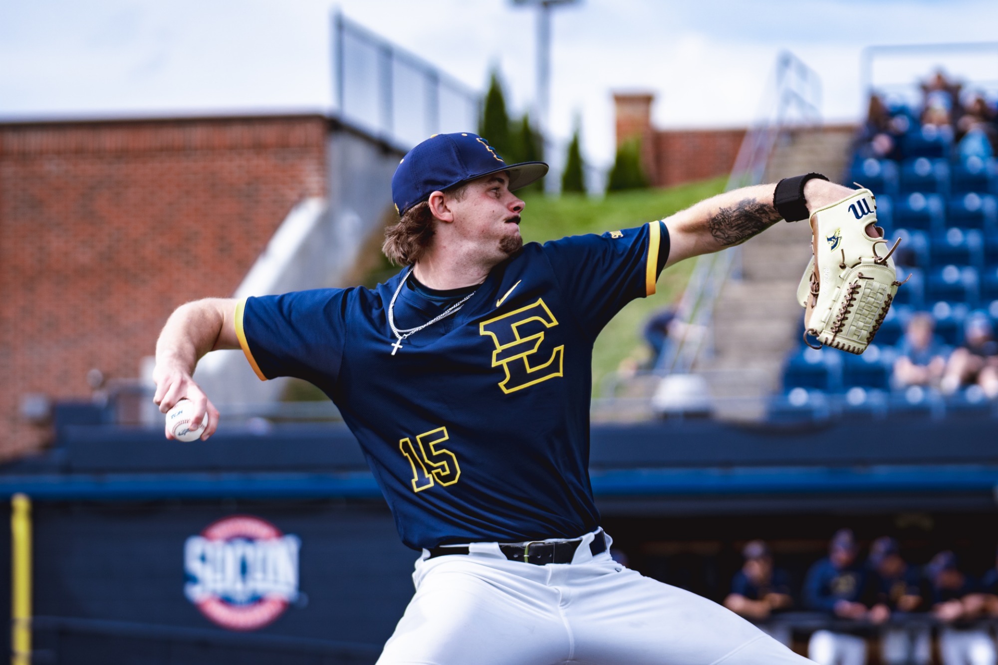 Evan Rolison delivers a pitch in a game against Bradley