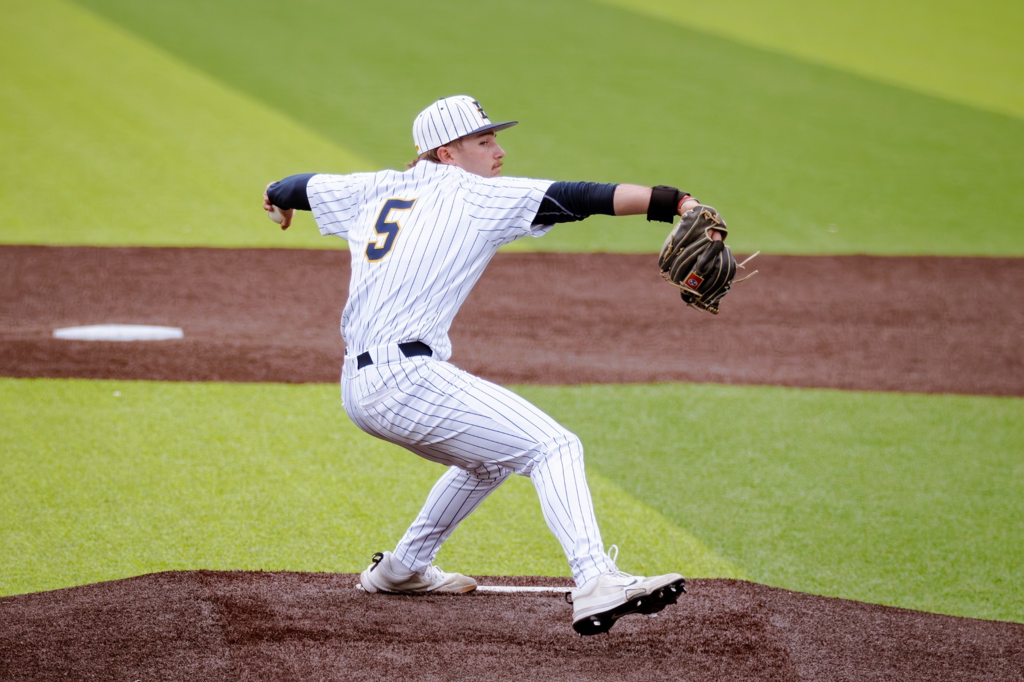 Derek McCarley delivers a pitch in a game against VMI
