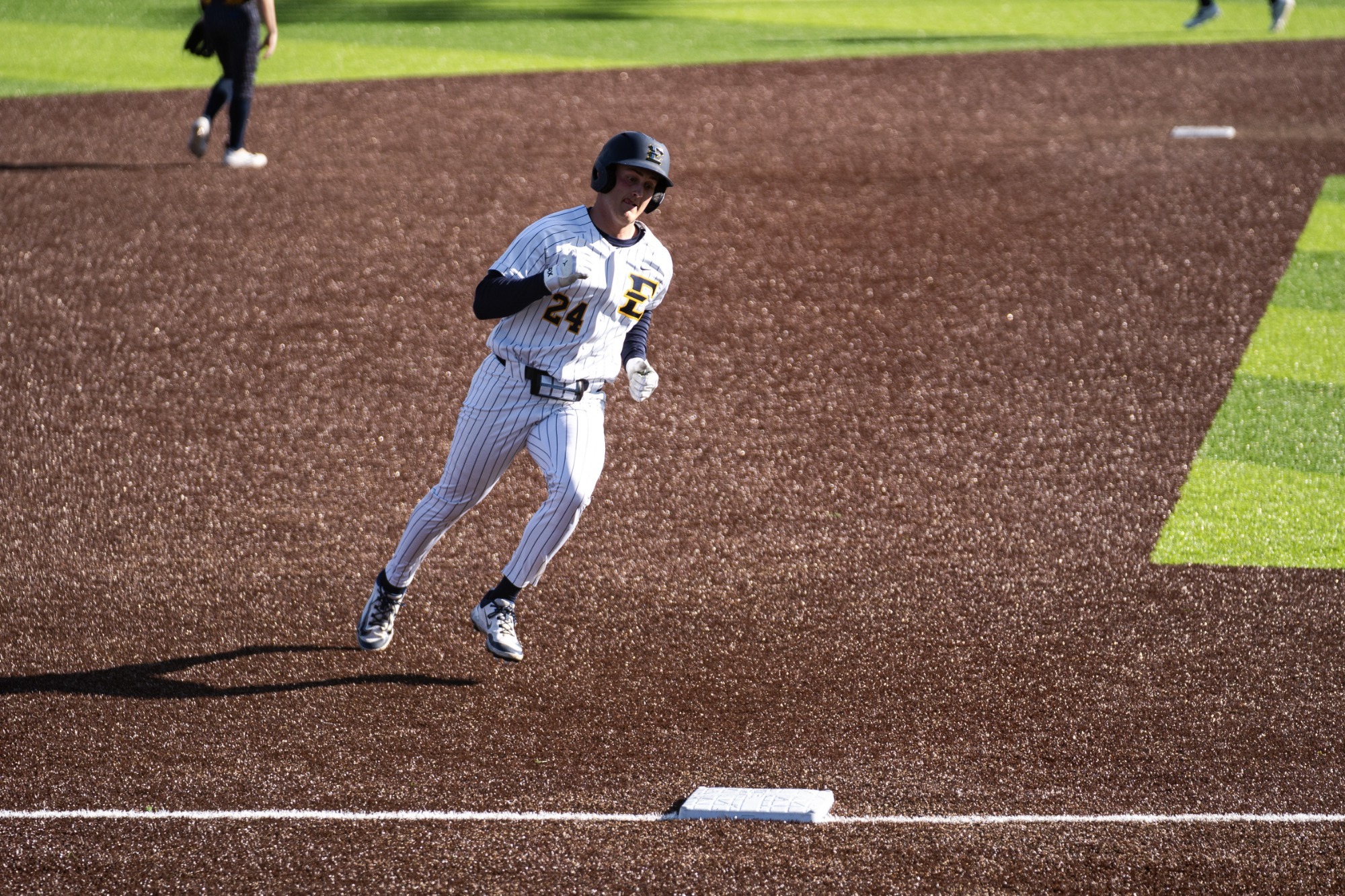 Tyler Fetterman rounds third base in a game against Quinnipiac