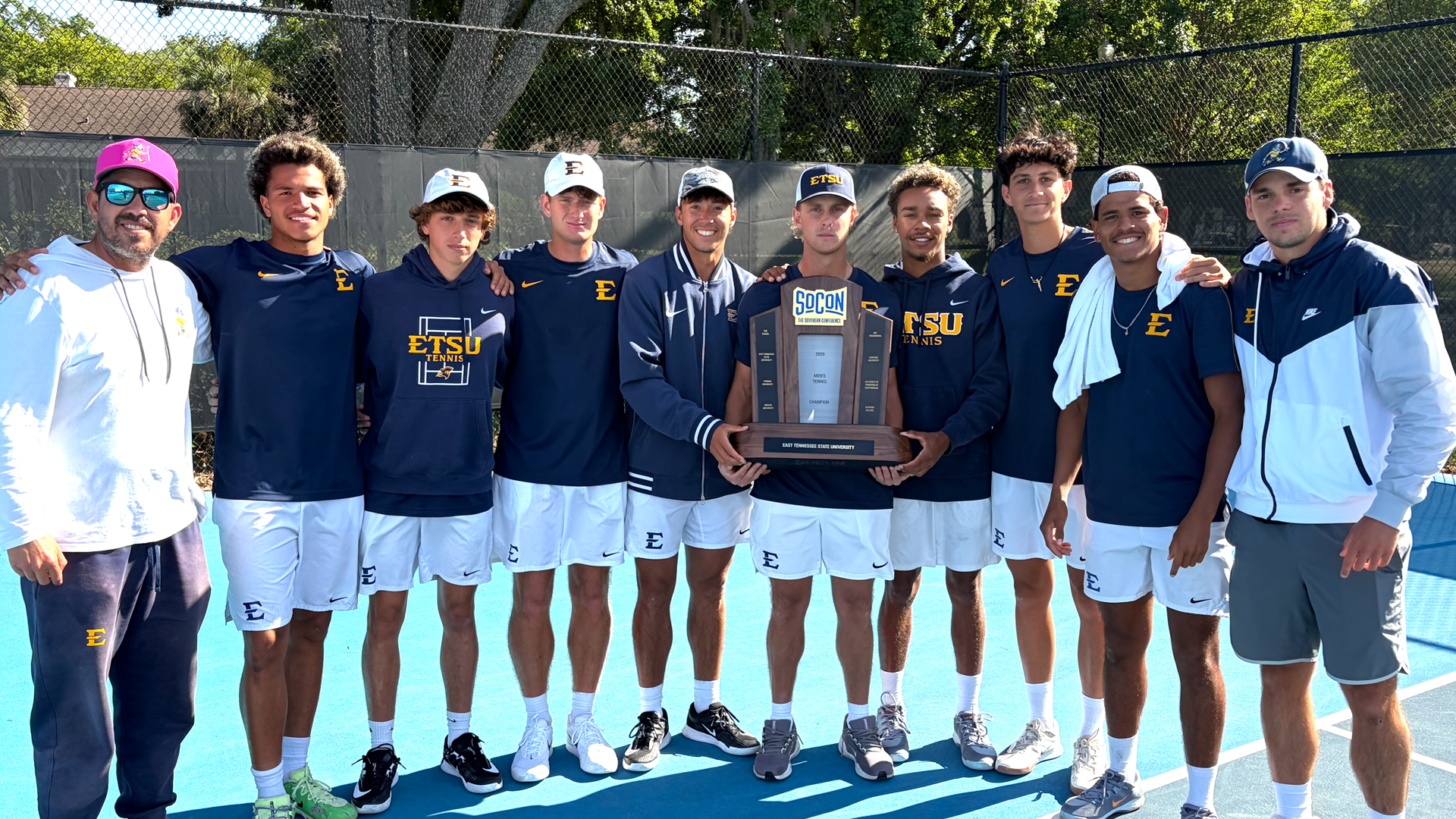 2026 ETSU Men's Tennis Team with the SoCon Regular Season Championship trophy following a 6-1 win over The Citadel