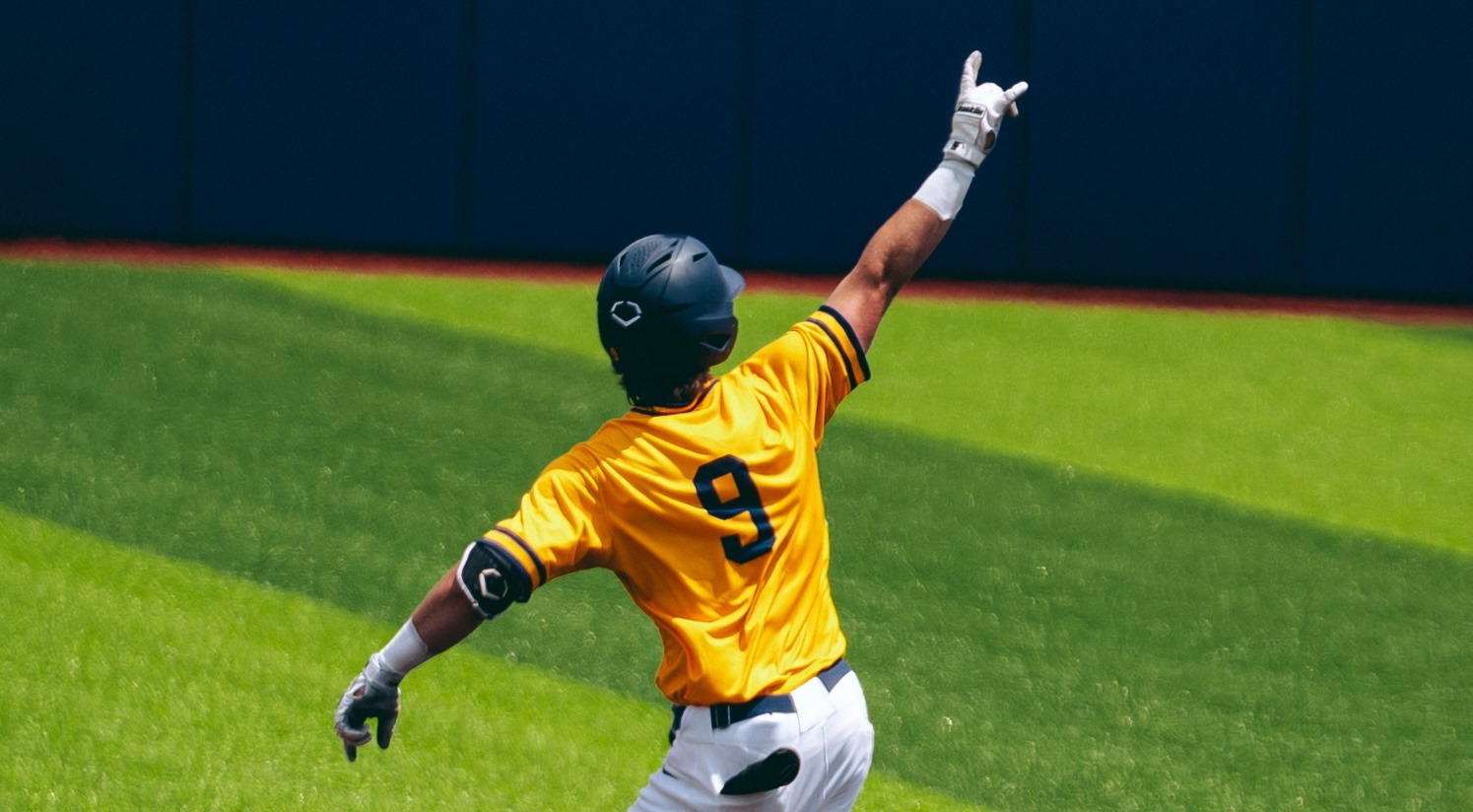Luke Matlock celebrates after hitting a home run against Mercer