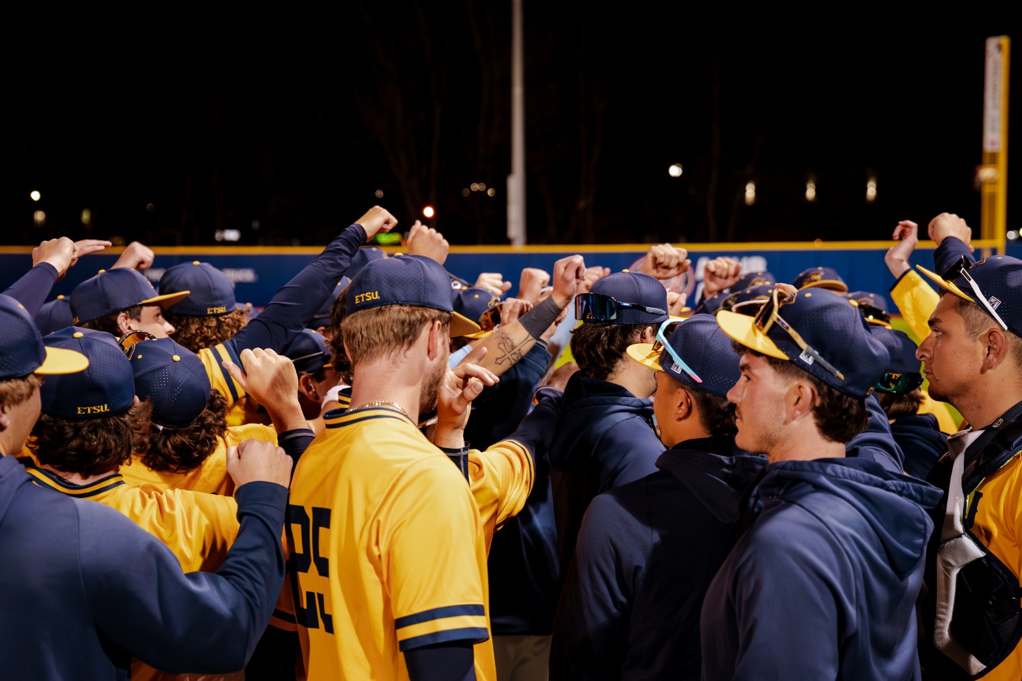 The ETSU baseball team huddles up after a game against Virginia Tech