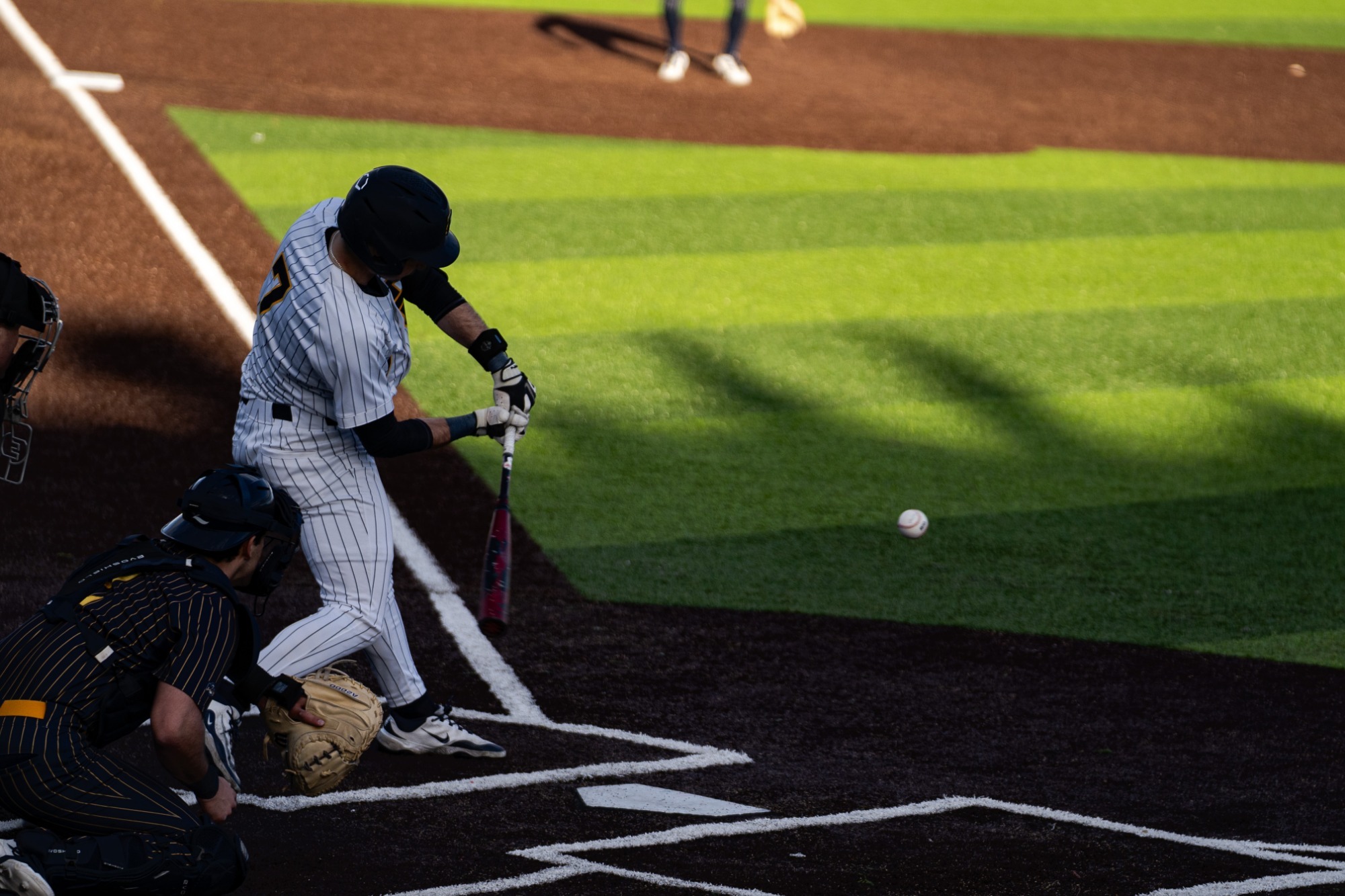 Mason Ault takes a swing at a pitch in a game against Quinnipiac