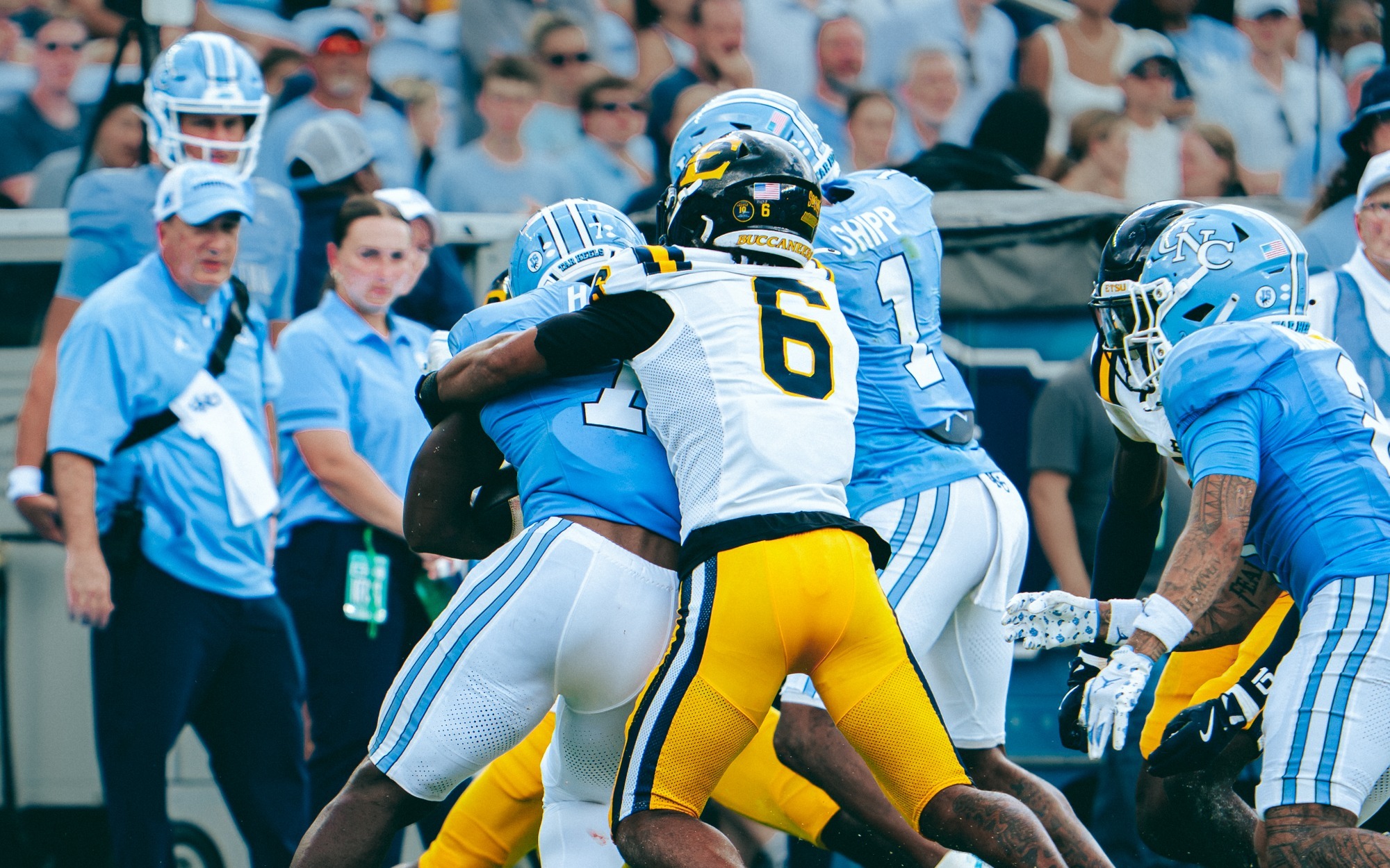 Jivon Oggs tackles a North Carolina ballcarrier