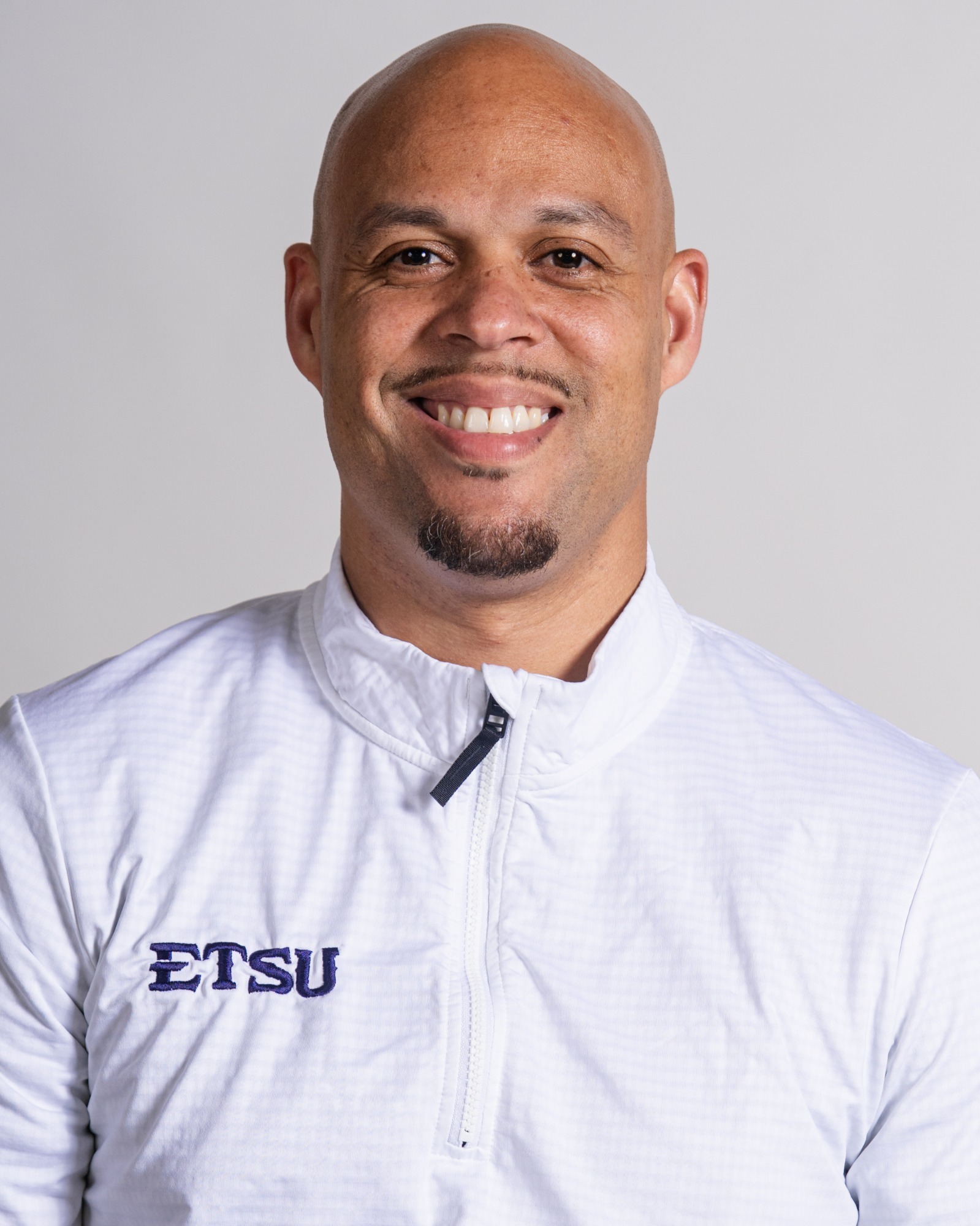 A headshot of Dwight Perry.