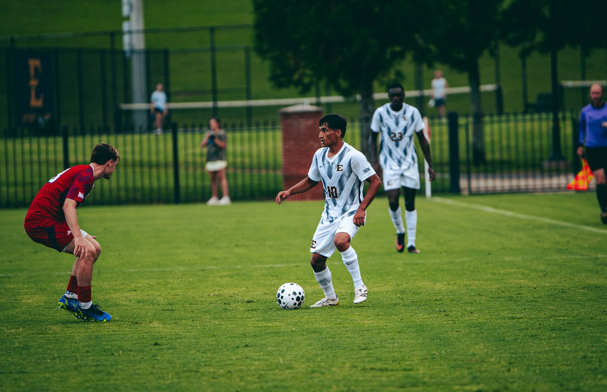 Jaime Carrillo goes one-on-one with a defender near the touch line during a soccer match with Belmont.