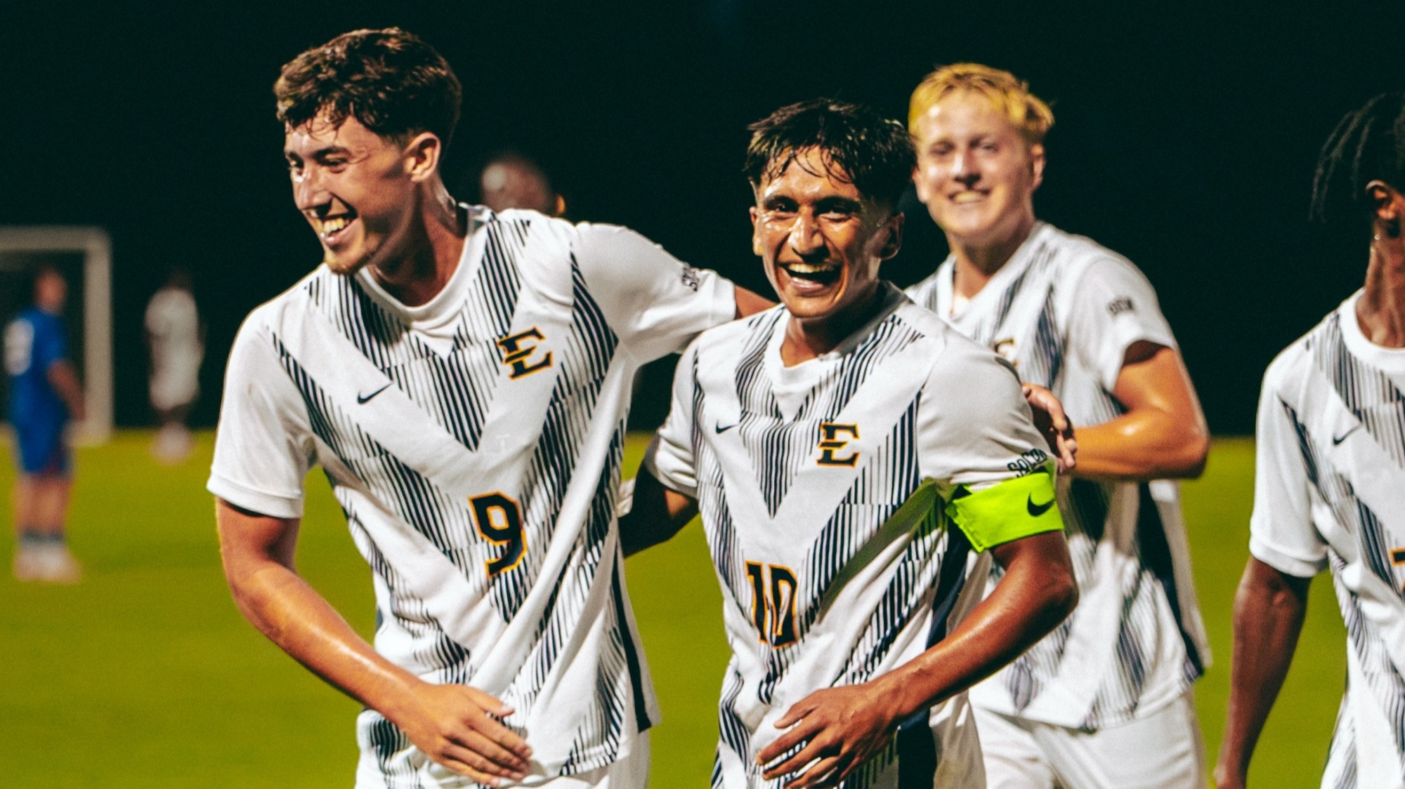 Jaime Carrillo celebrates the third goal of his historic hat trick against Presbyterian. Gavin Dick, who assisted on the third goal, runs alongside him in celebration.