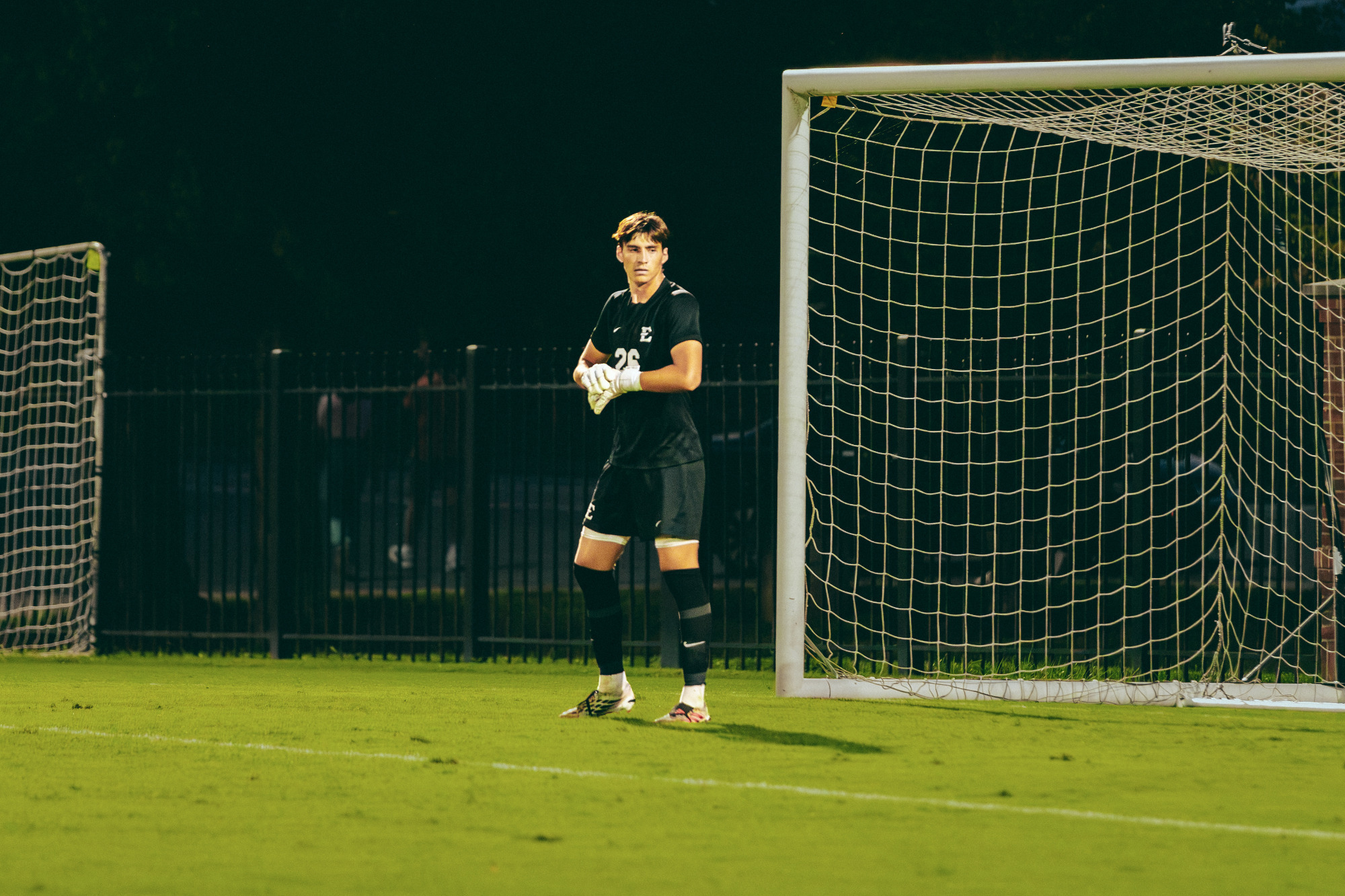 Elijah Keener tends goal for ETSU during a soccer match against Presbyterian.