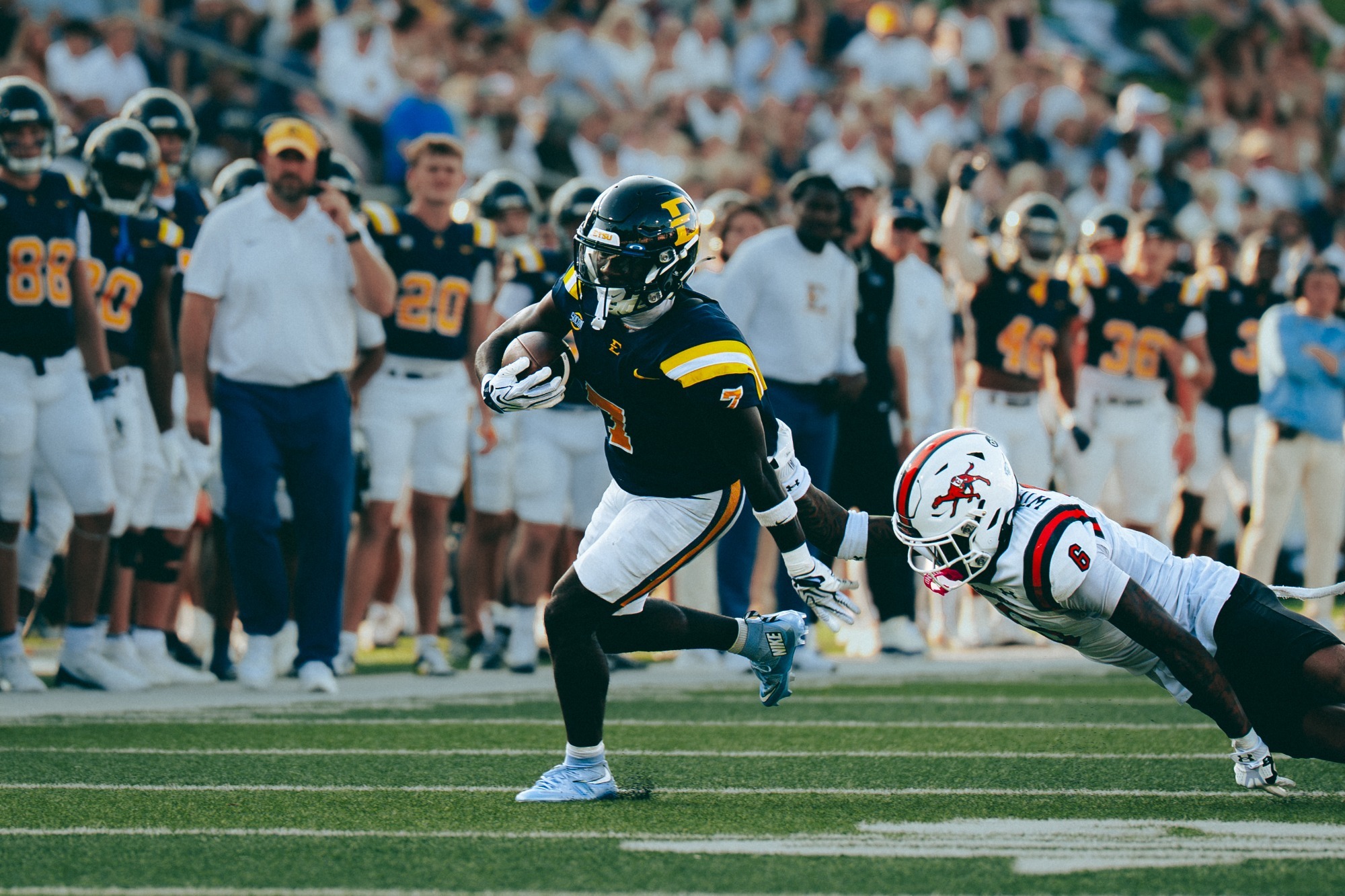 Jaiden Daniels carries the ball in a matchup against Campbell to begin the 2026 football season
