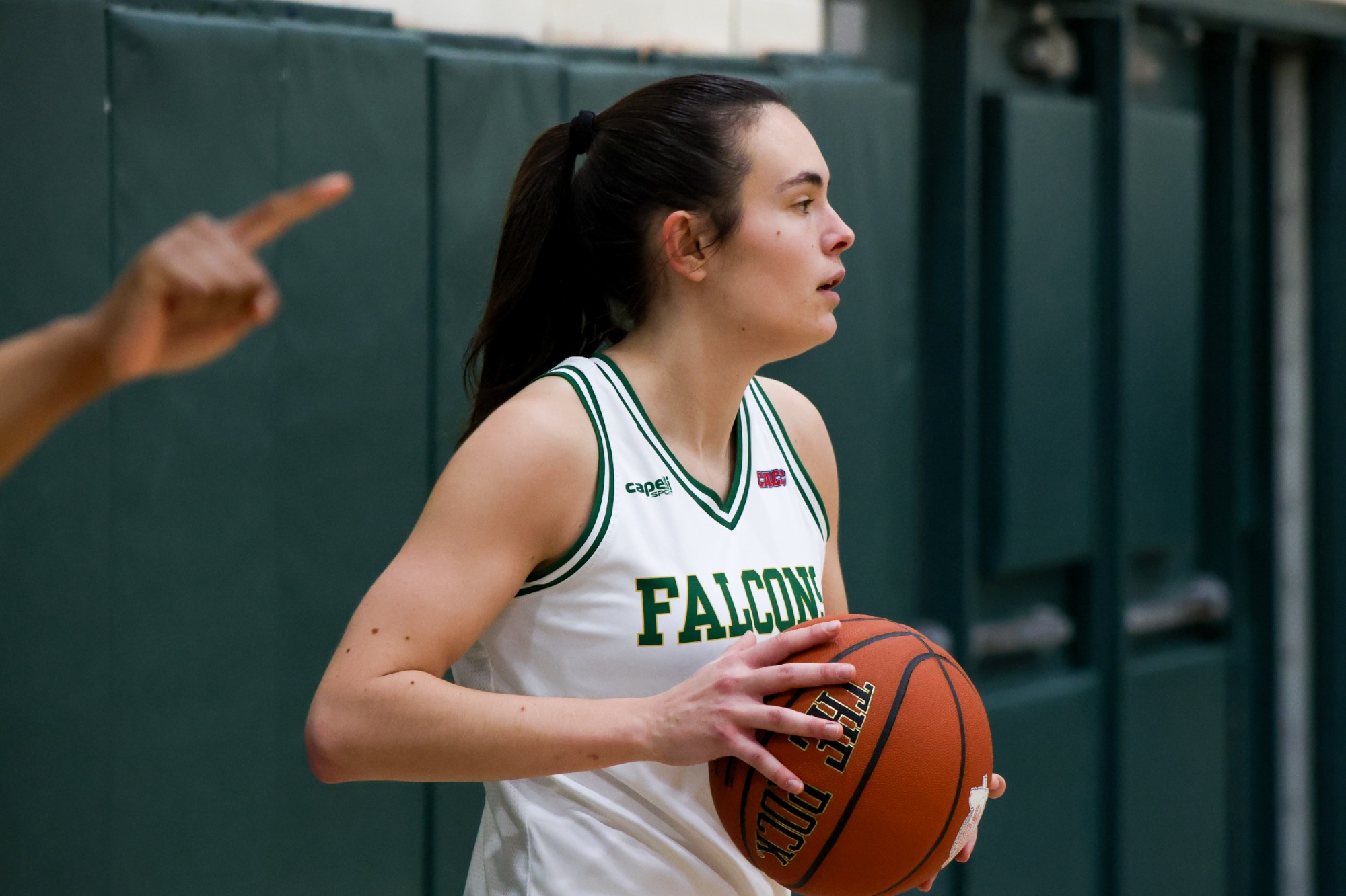 Ane Valle looks to pass the ball into the offense.