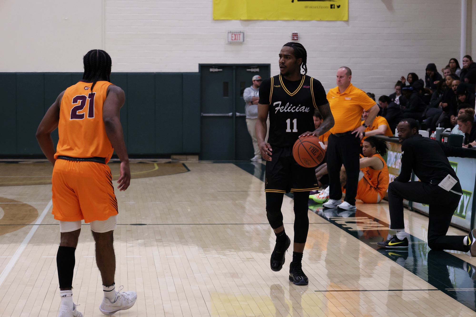 Jeremiah Anderson drilling the ball up the court.