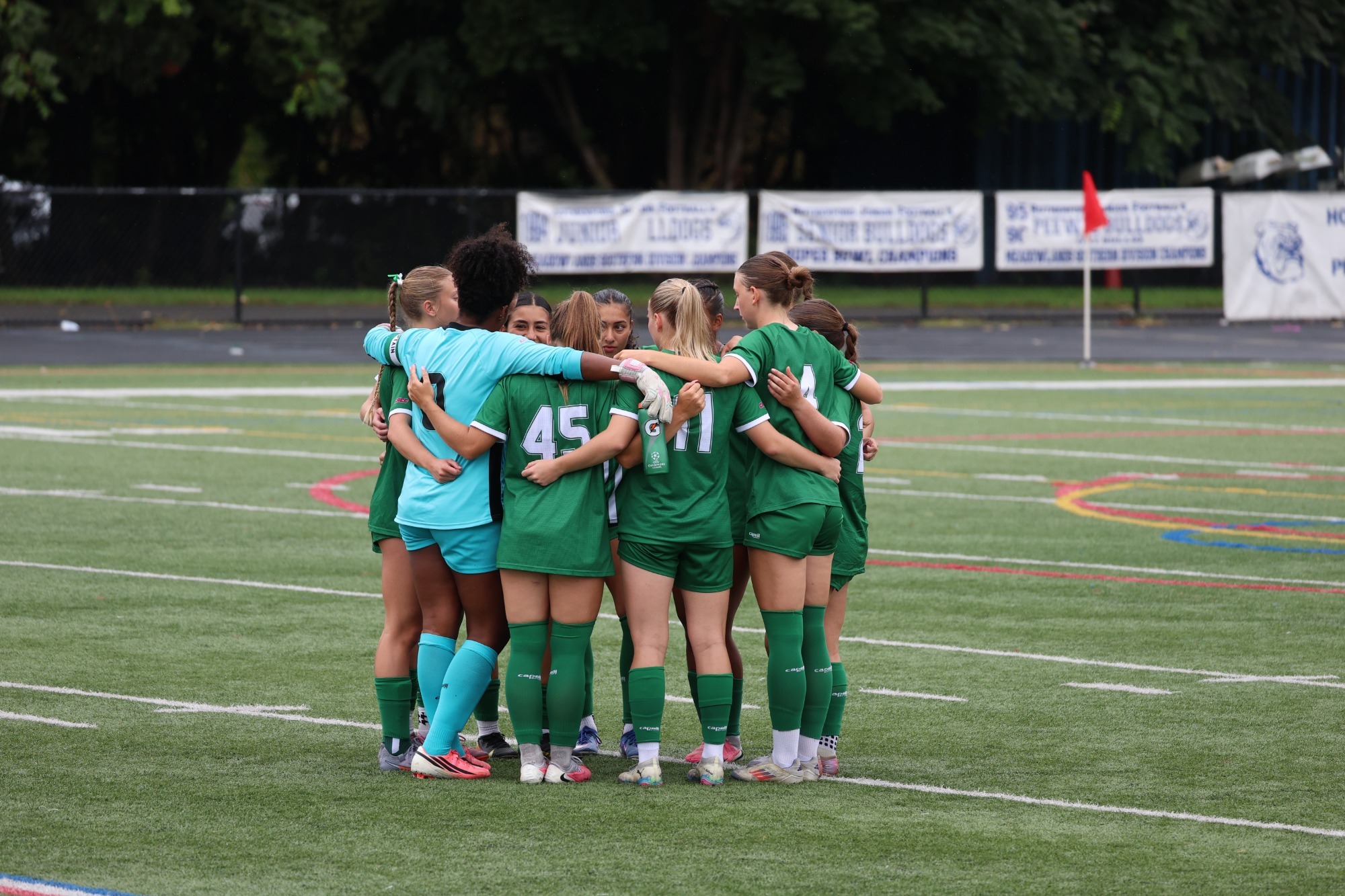 Women's Soccer Team pregame huddle